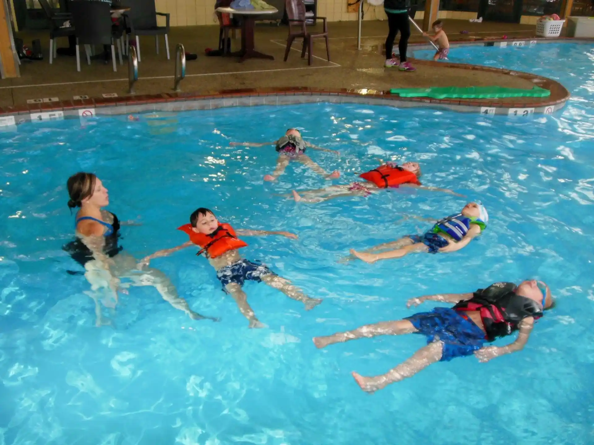 a group of people in a pool