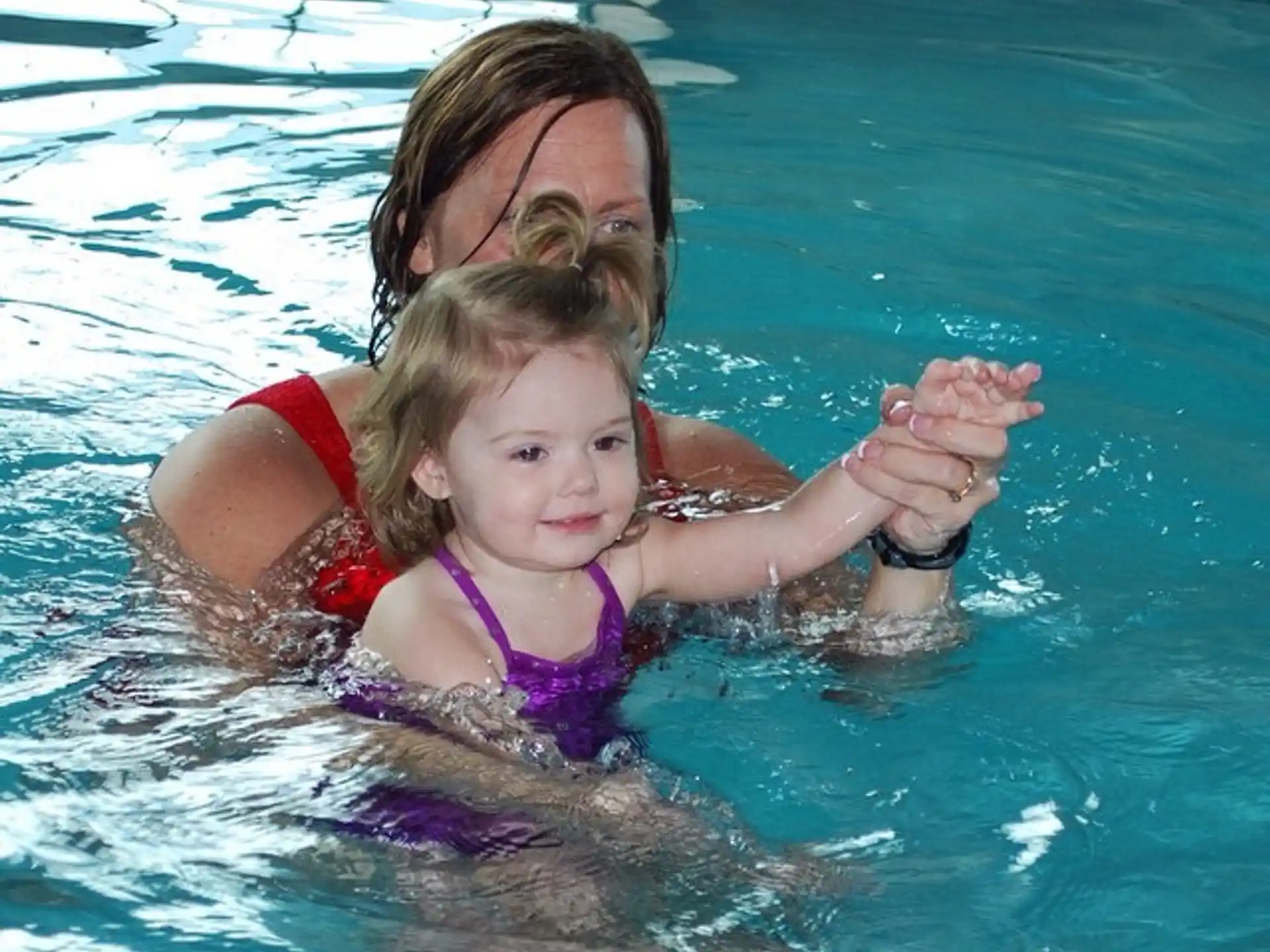 a person and a child in the water