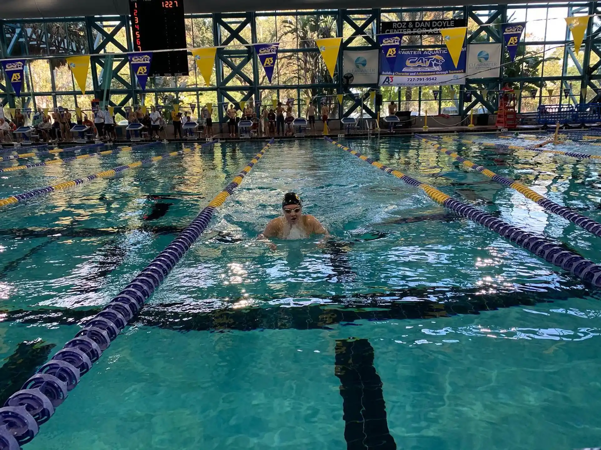 a couple of people in a pool