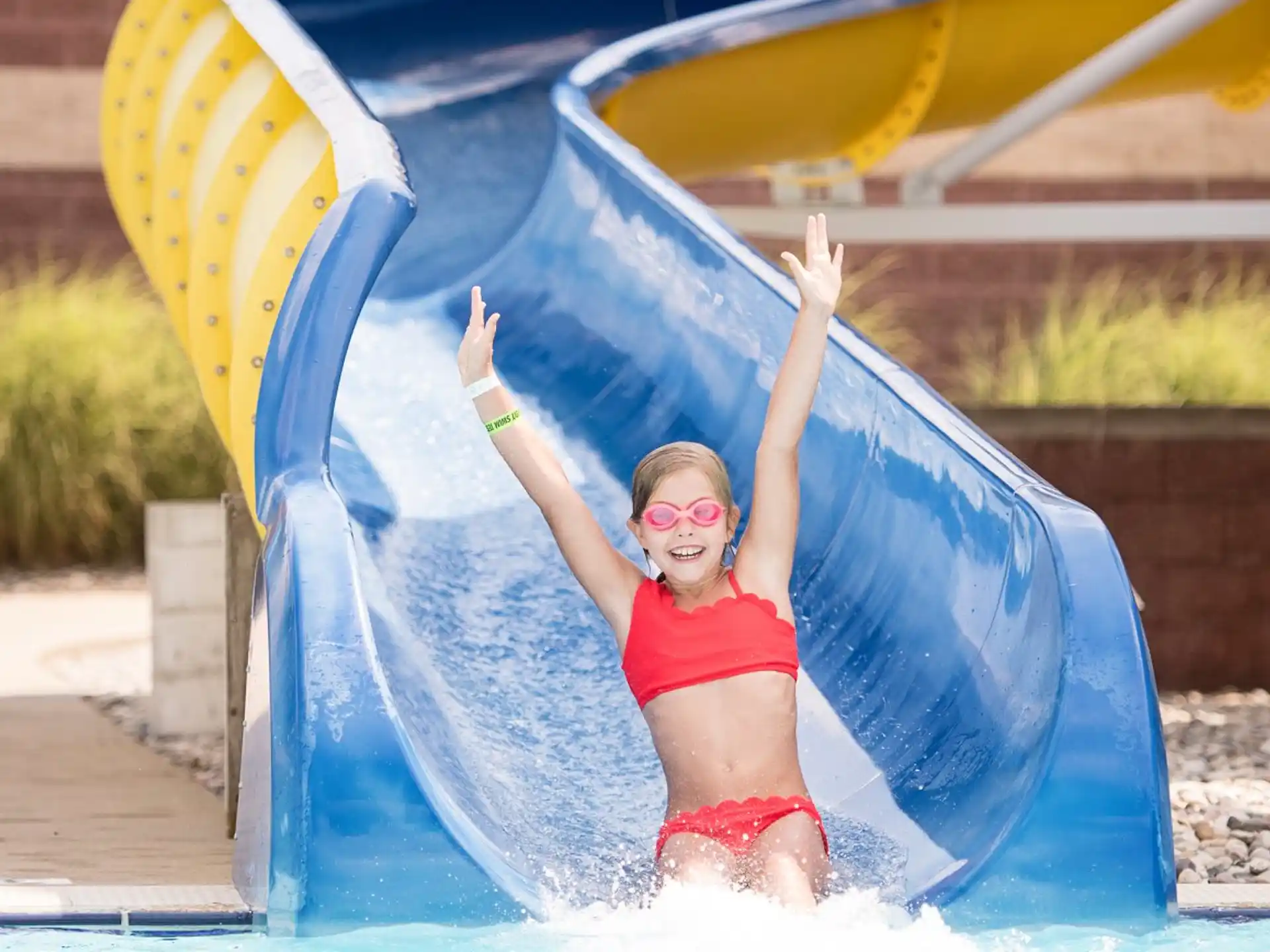 a child in a water slide