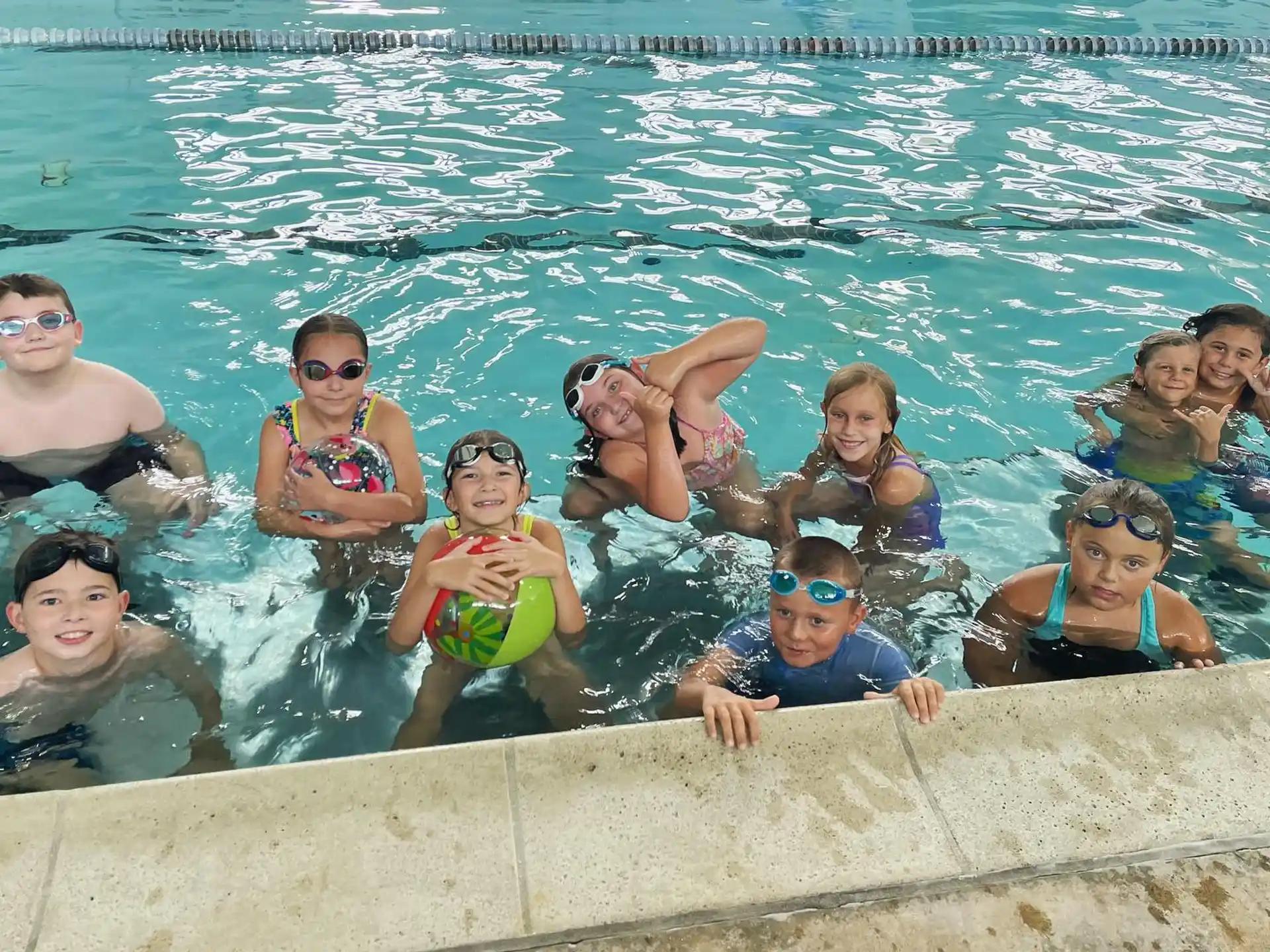 a group of people in a pool