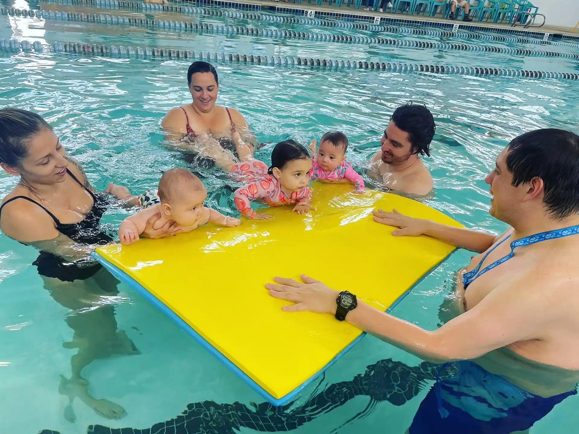 a group of people in a pool