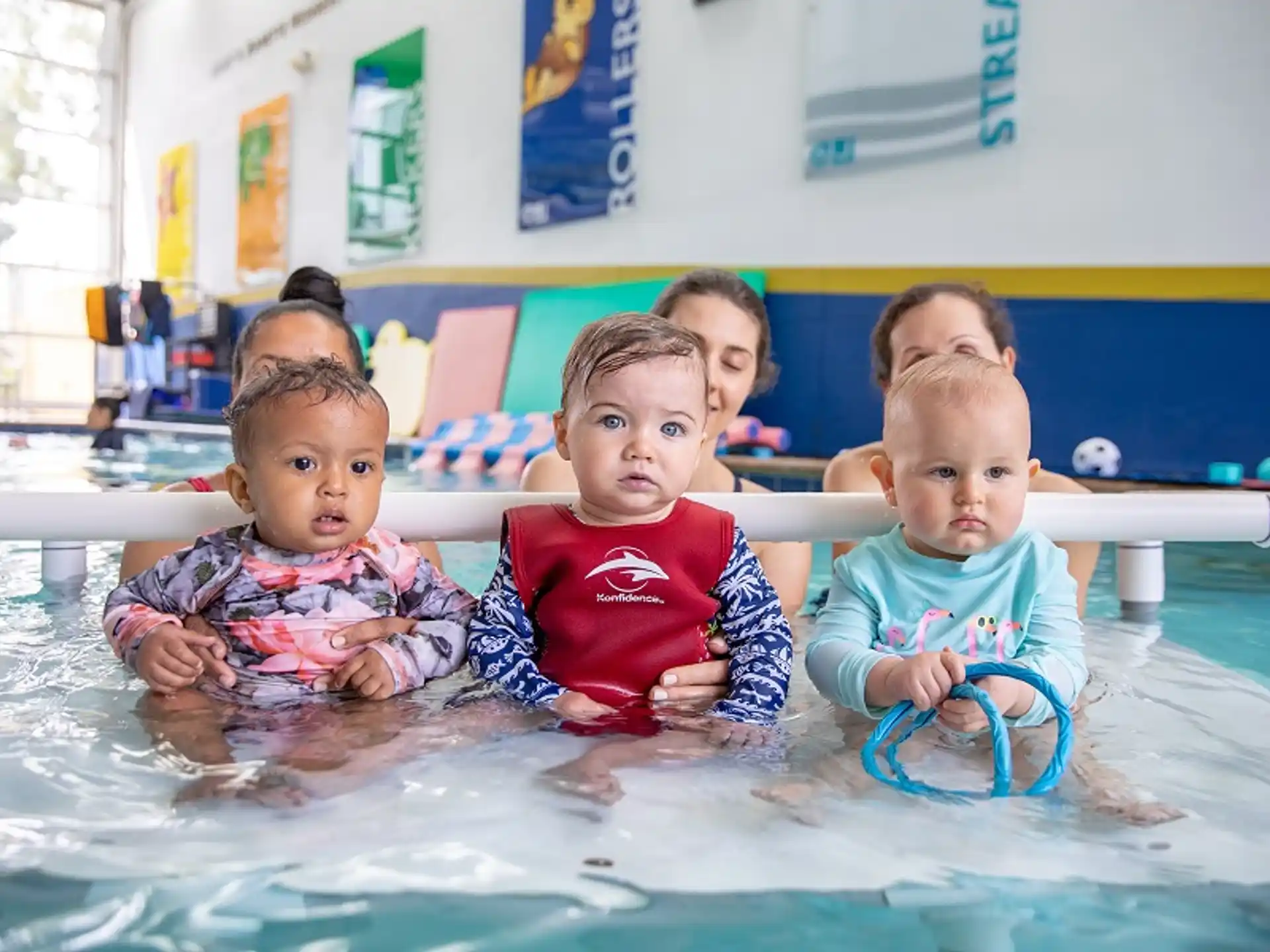 a group of children in a pool