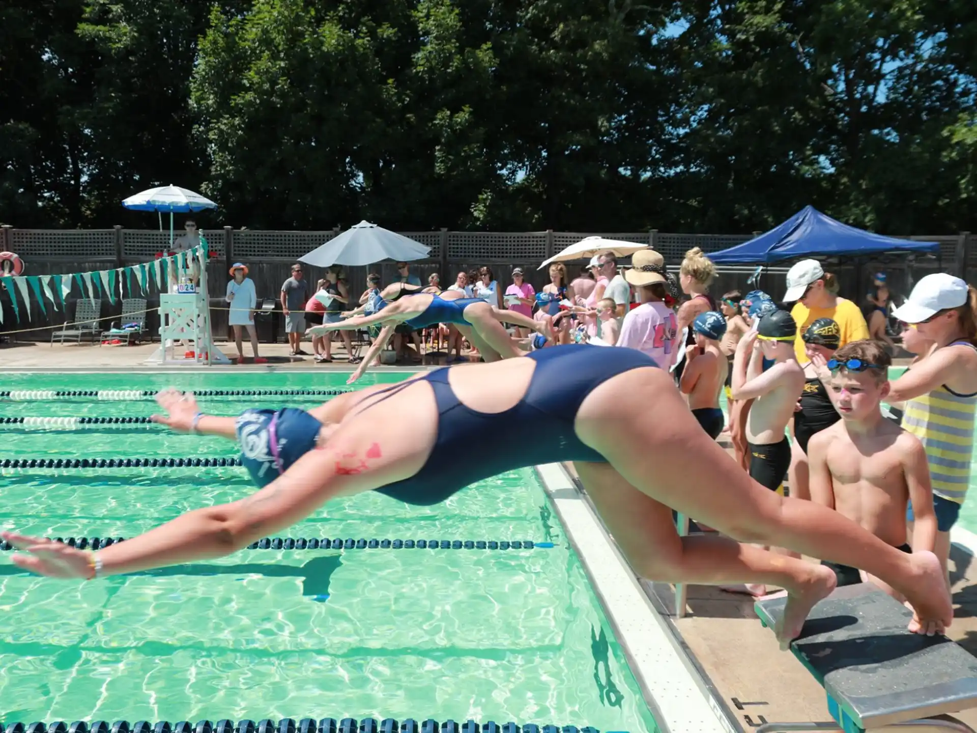 a group of people in a pool