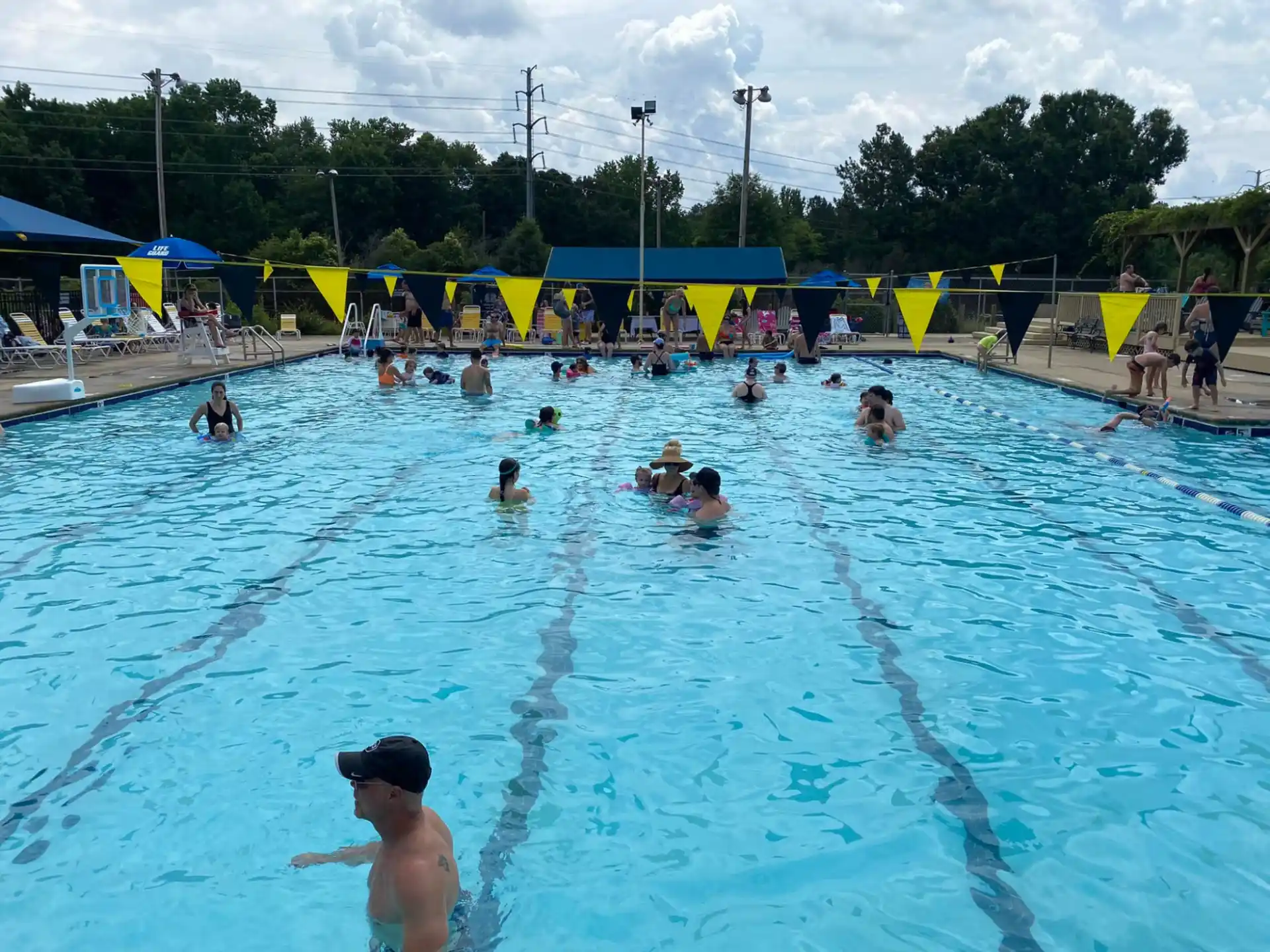 a group of people in a pool