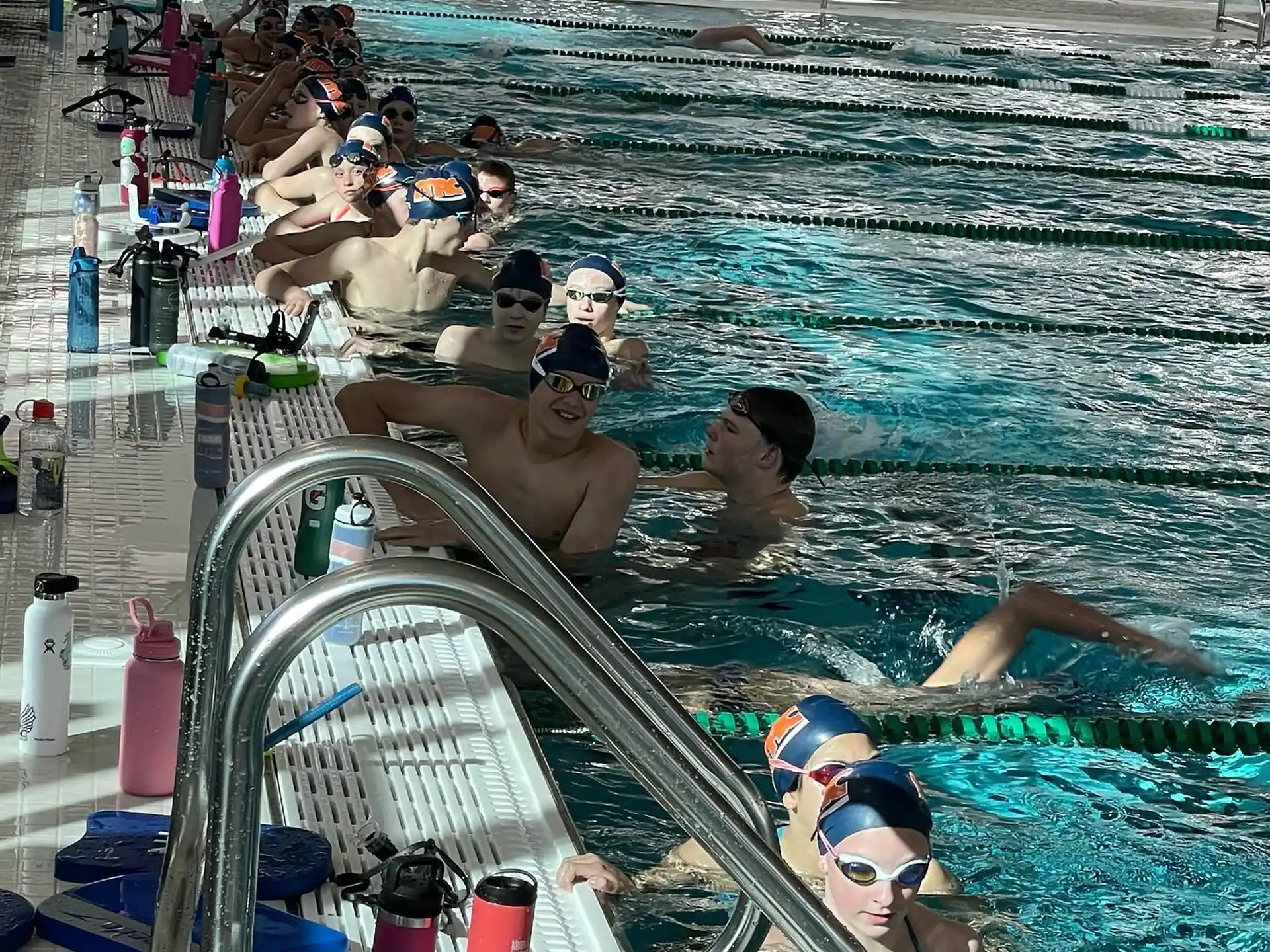 a group of people in a pool
