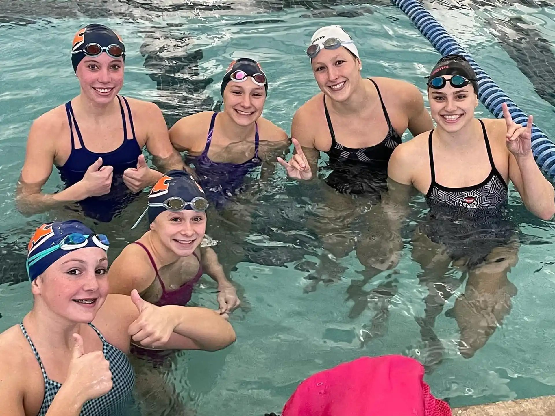 a group of women in the water
