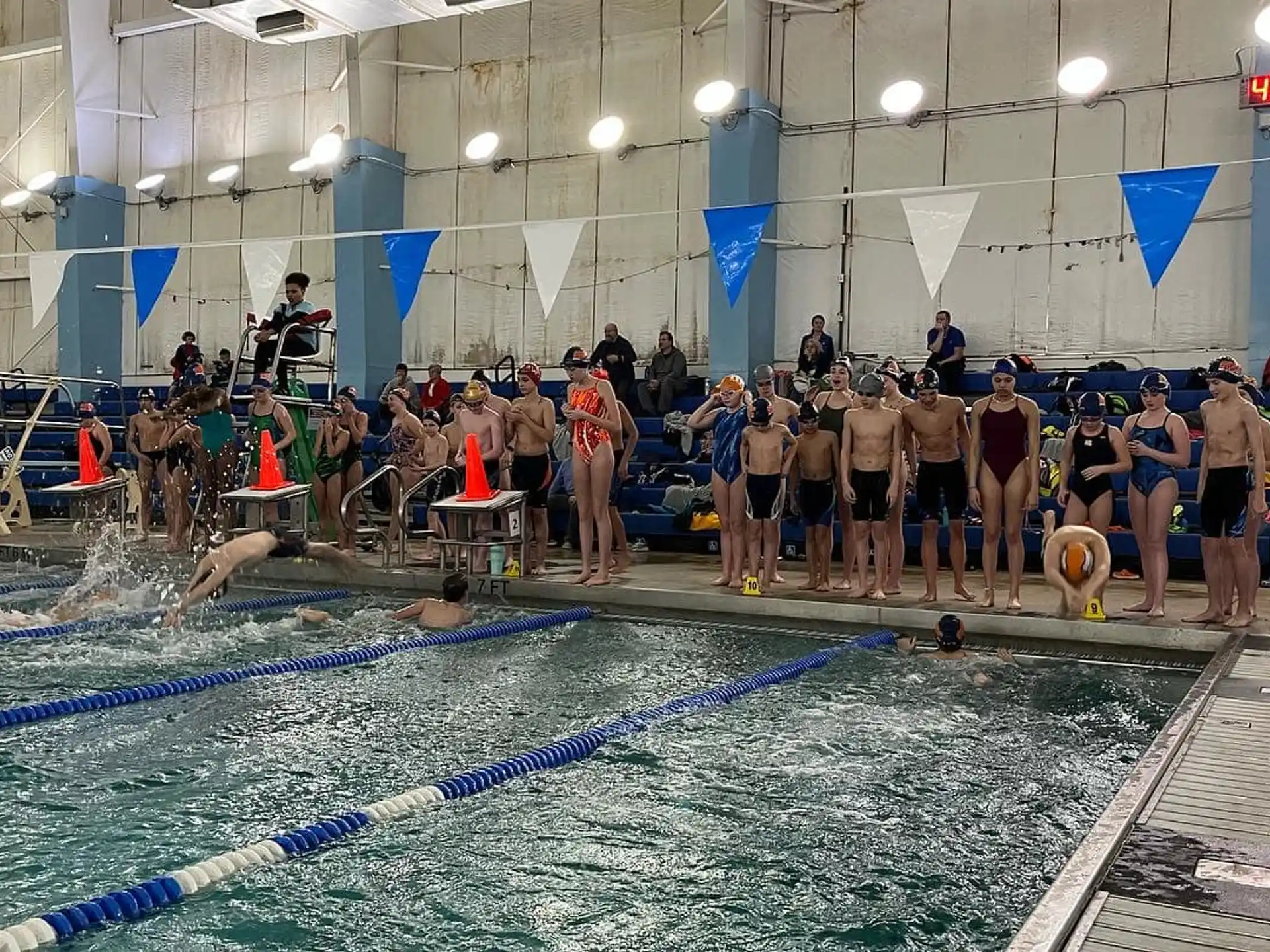 a group of people in a swimming pool
