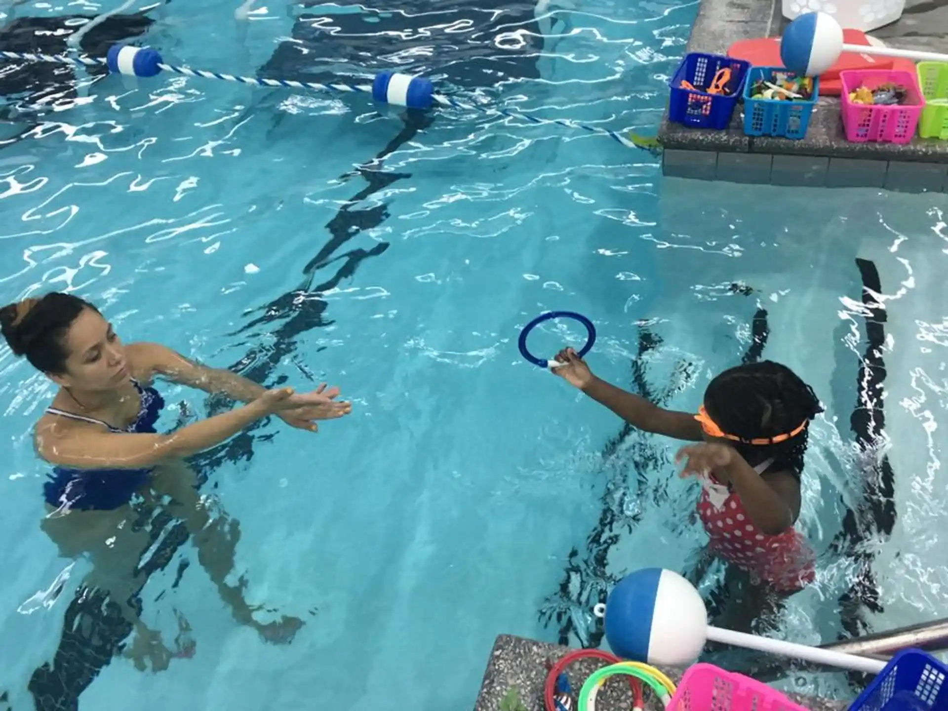 a couple of women in a pool