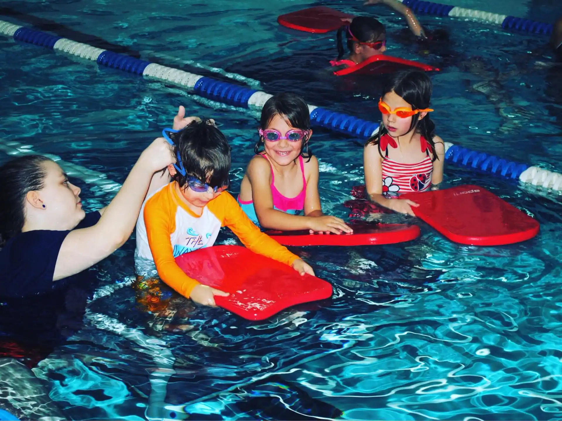a group of people in a pool
