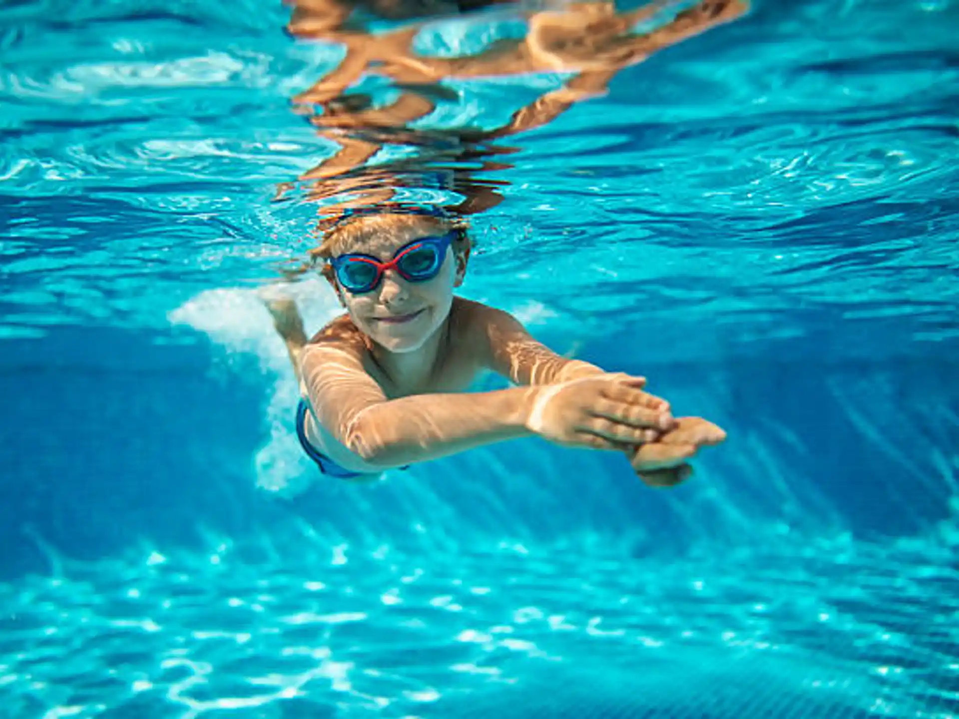 a person swimming in a pool