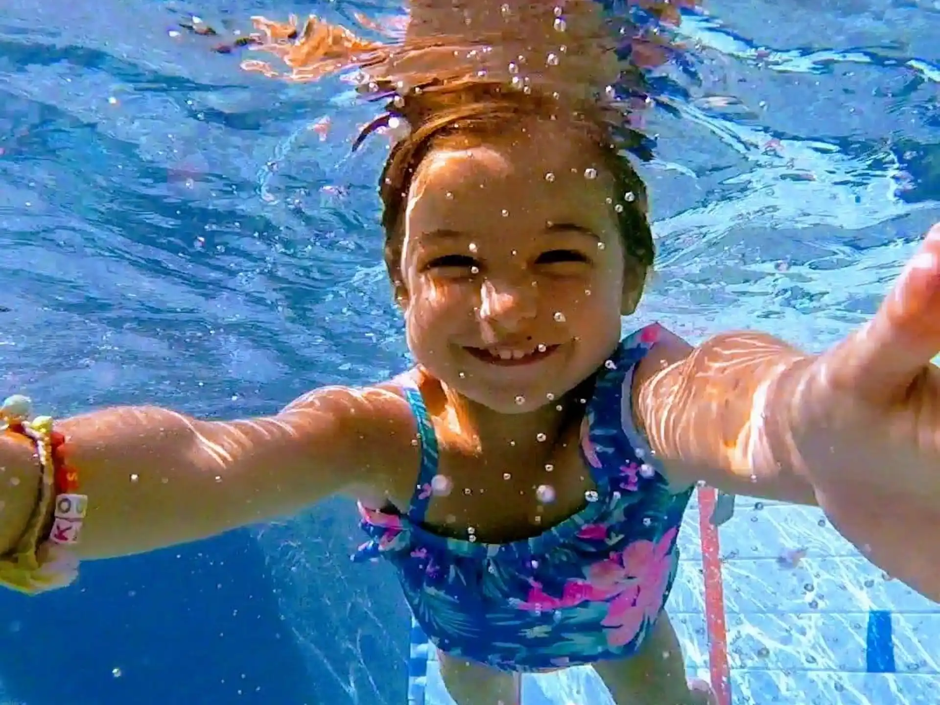 a girl in a pool