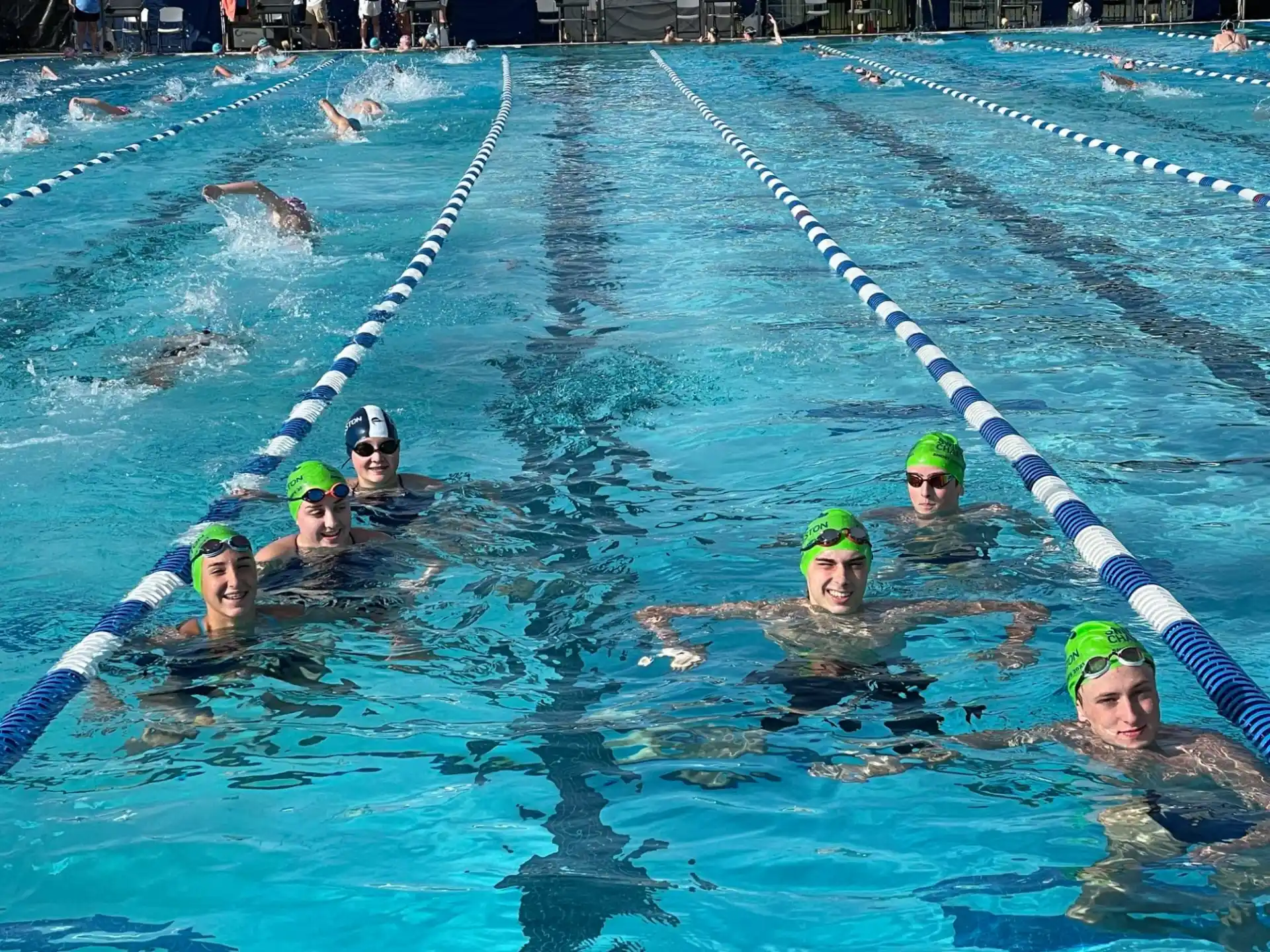 a group of people in a pool