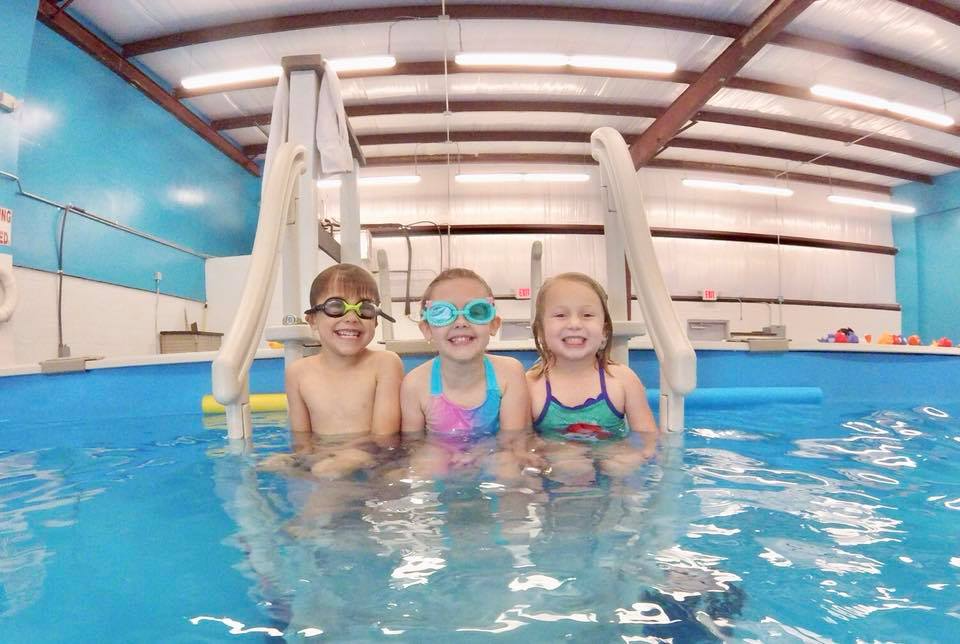 a group of people in a pool