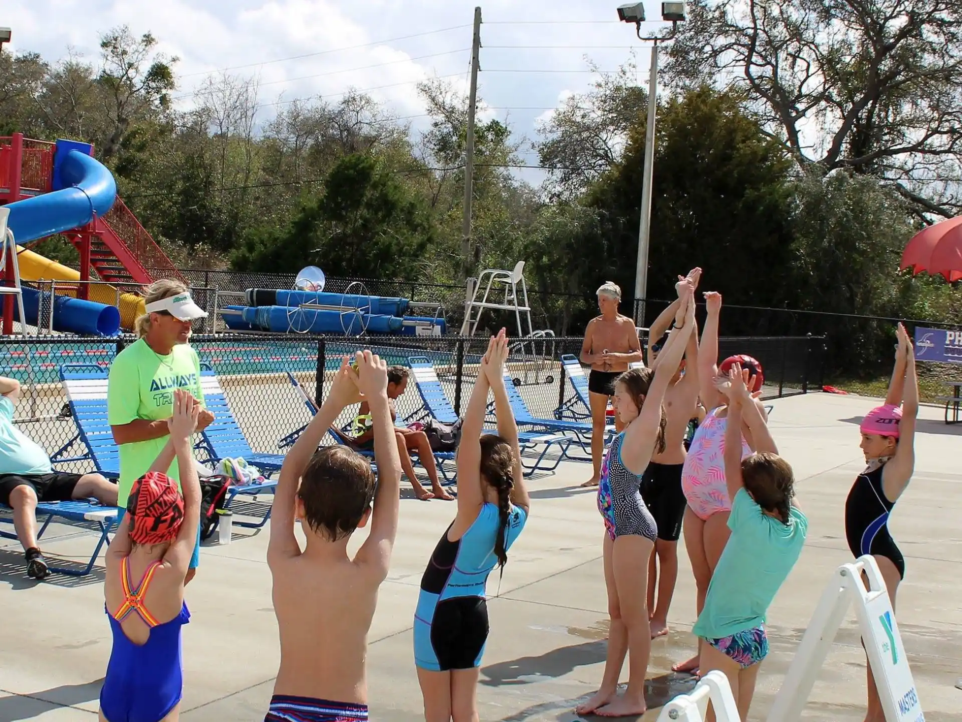 a group of people playing volleyball