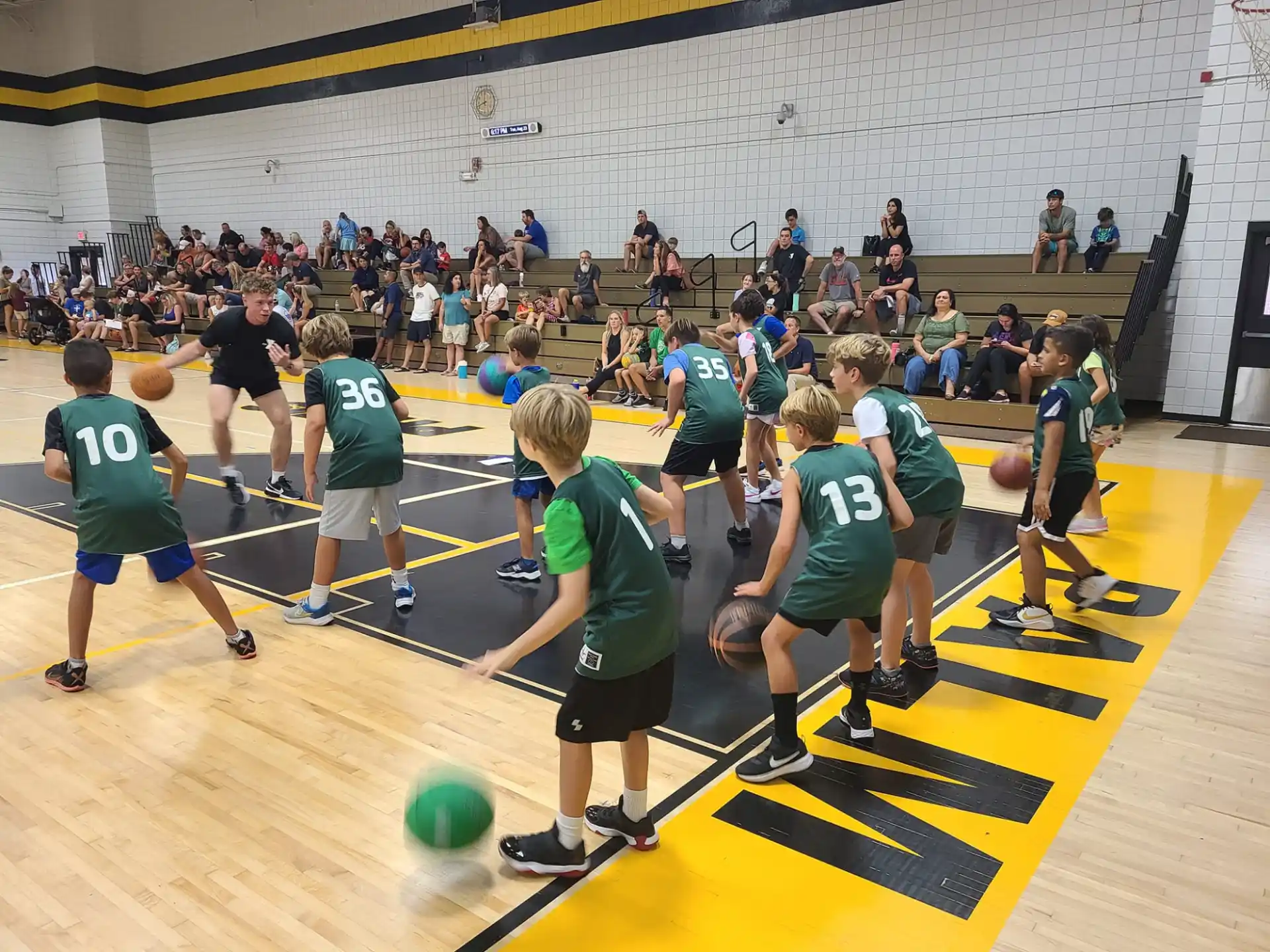 a group of people playing volleyball