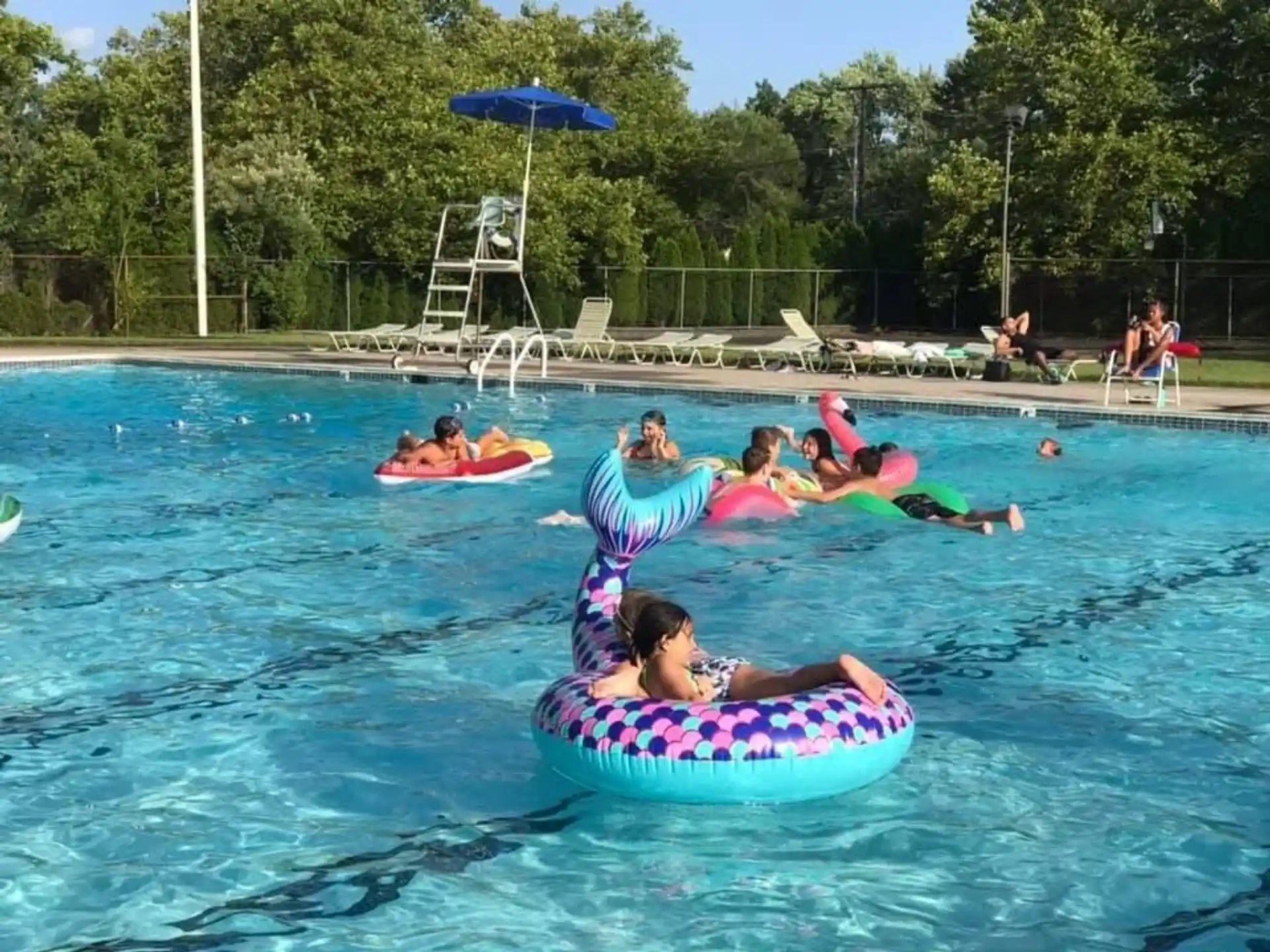 a group of people in a pool