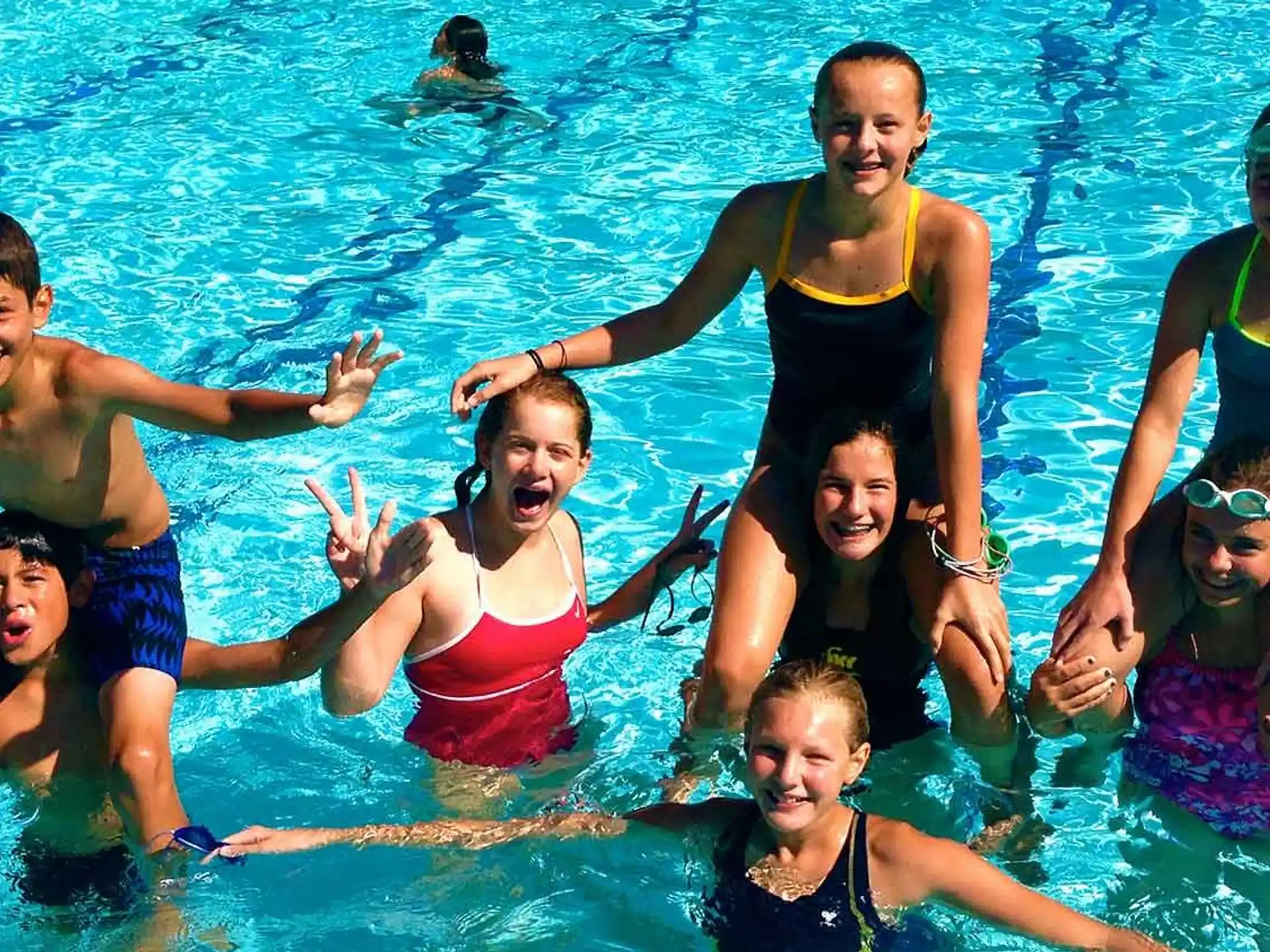 a group of people in a pool