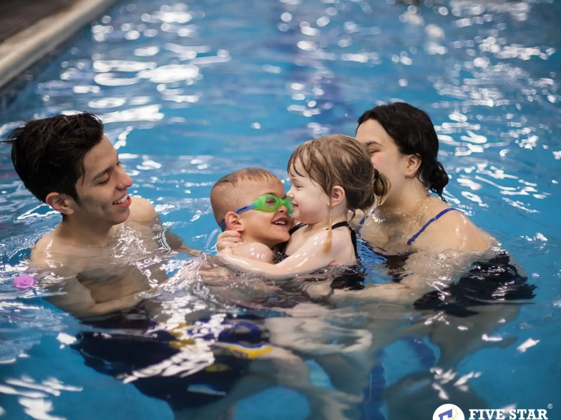 a group of people in a pool