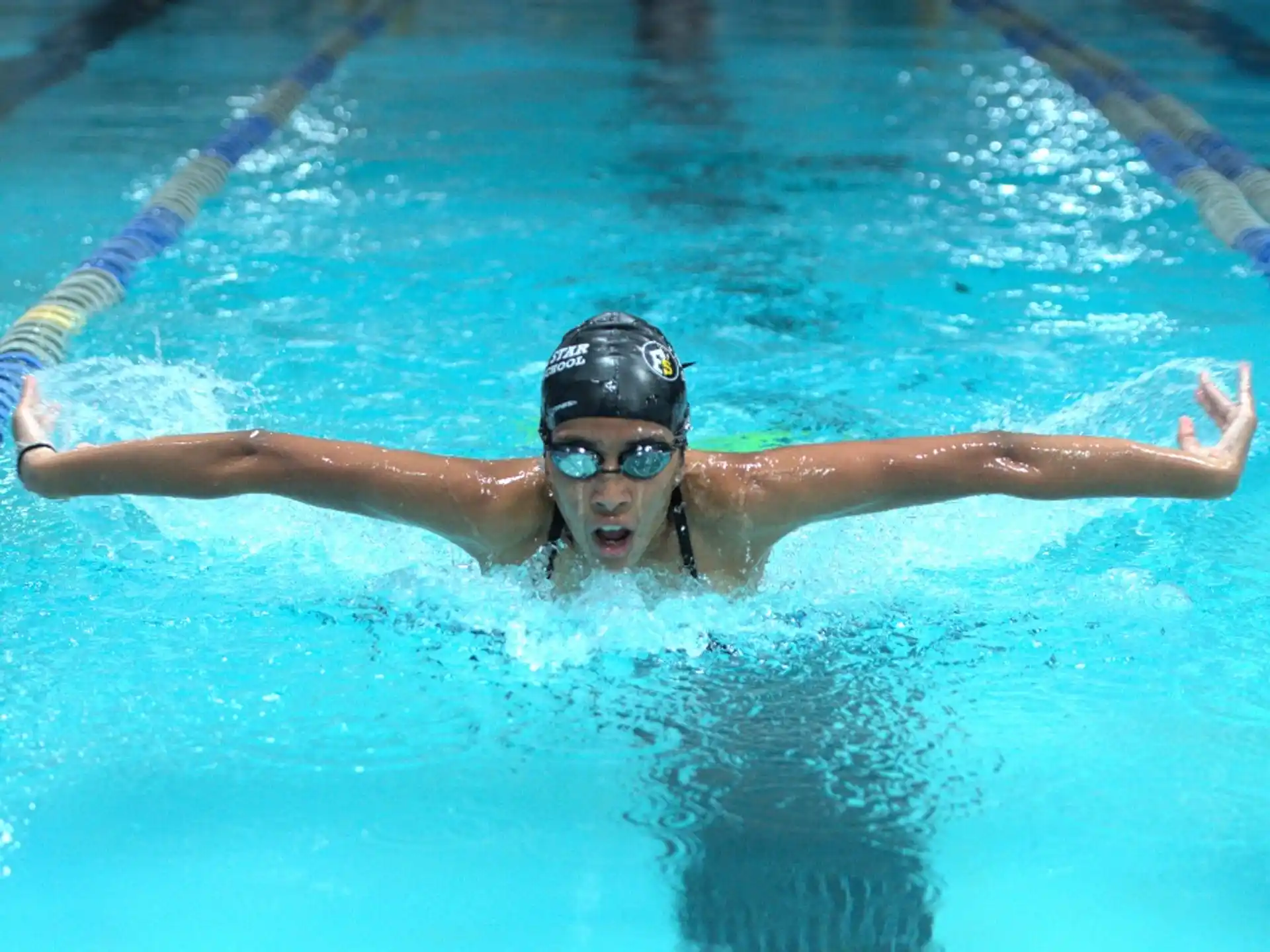 a person swimming in a pool
