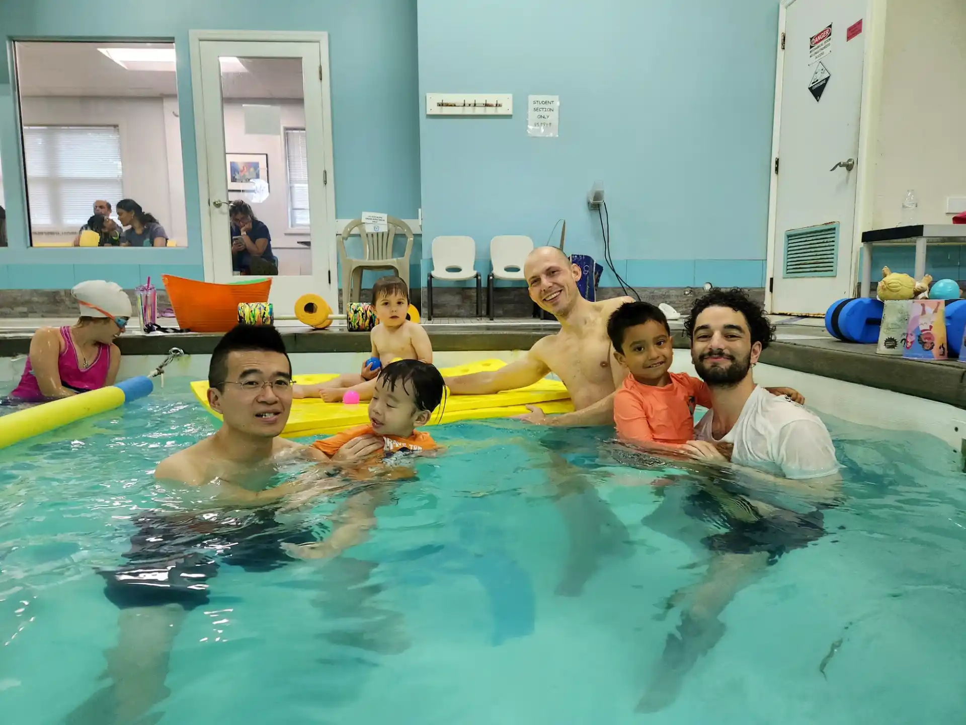 a group of people in a pool