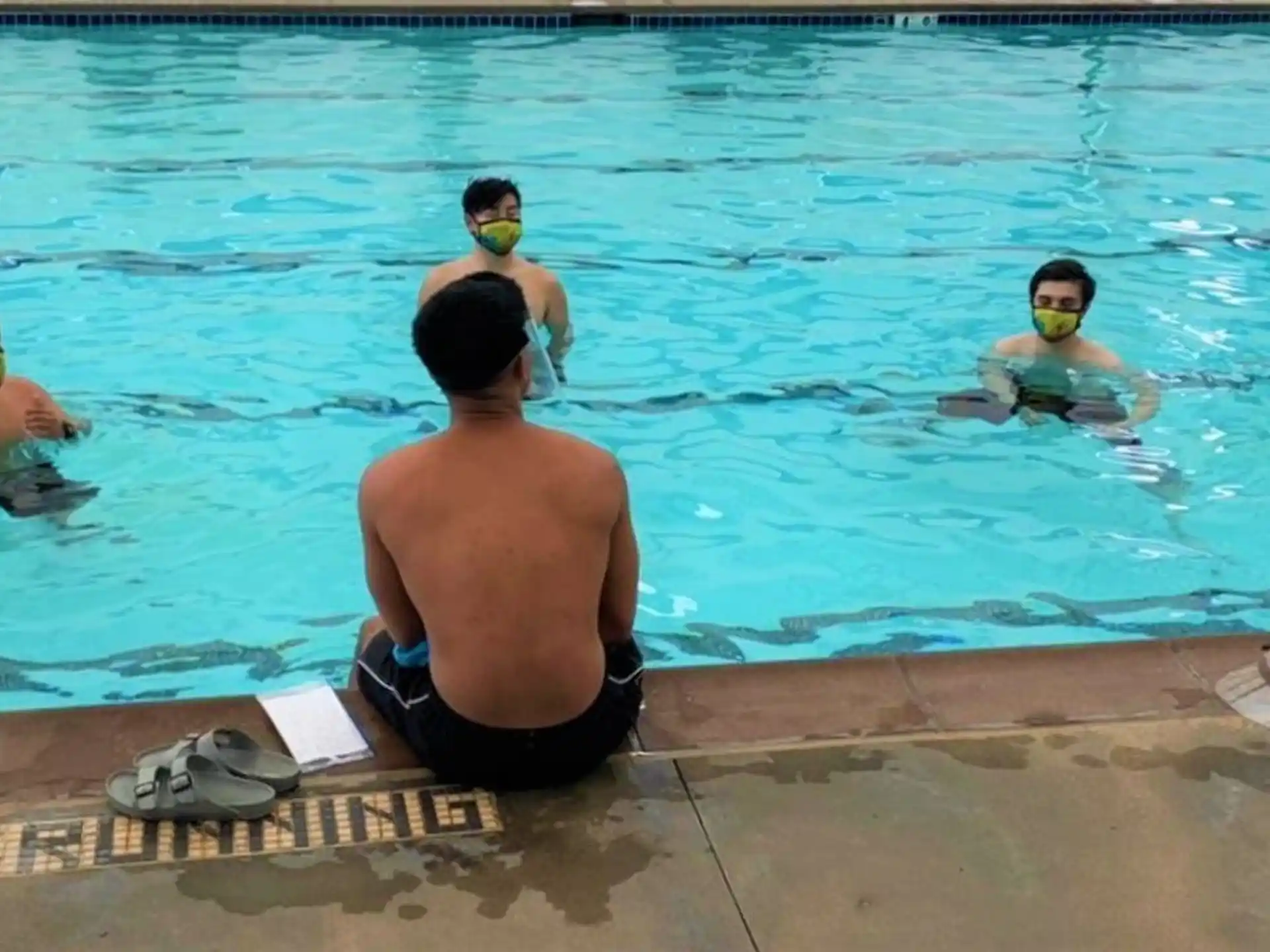 a group of people in a pool