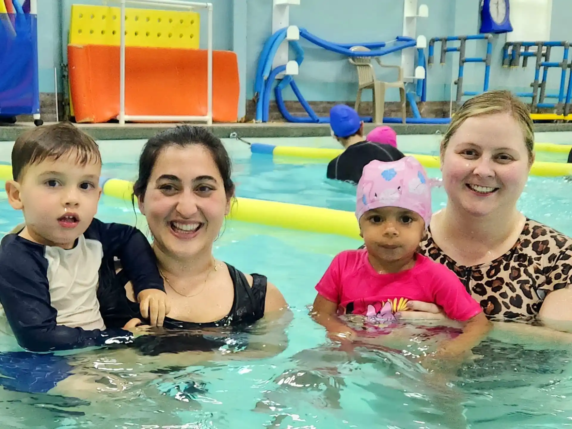 a group of people in a pool