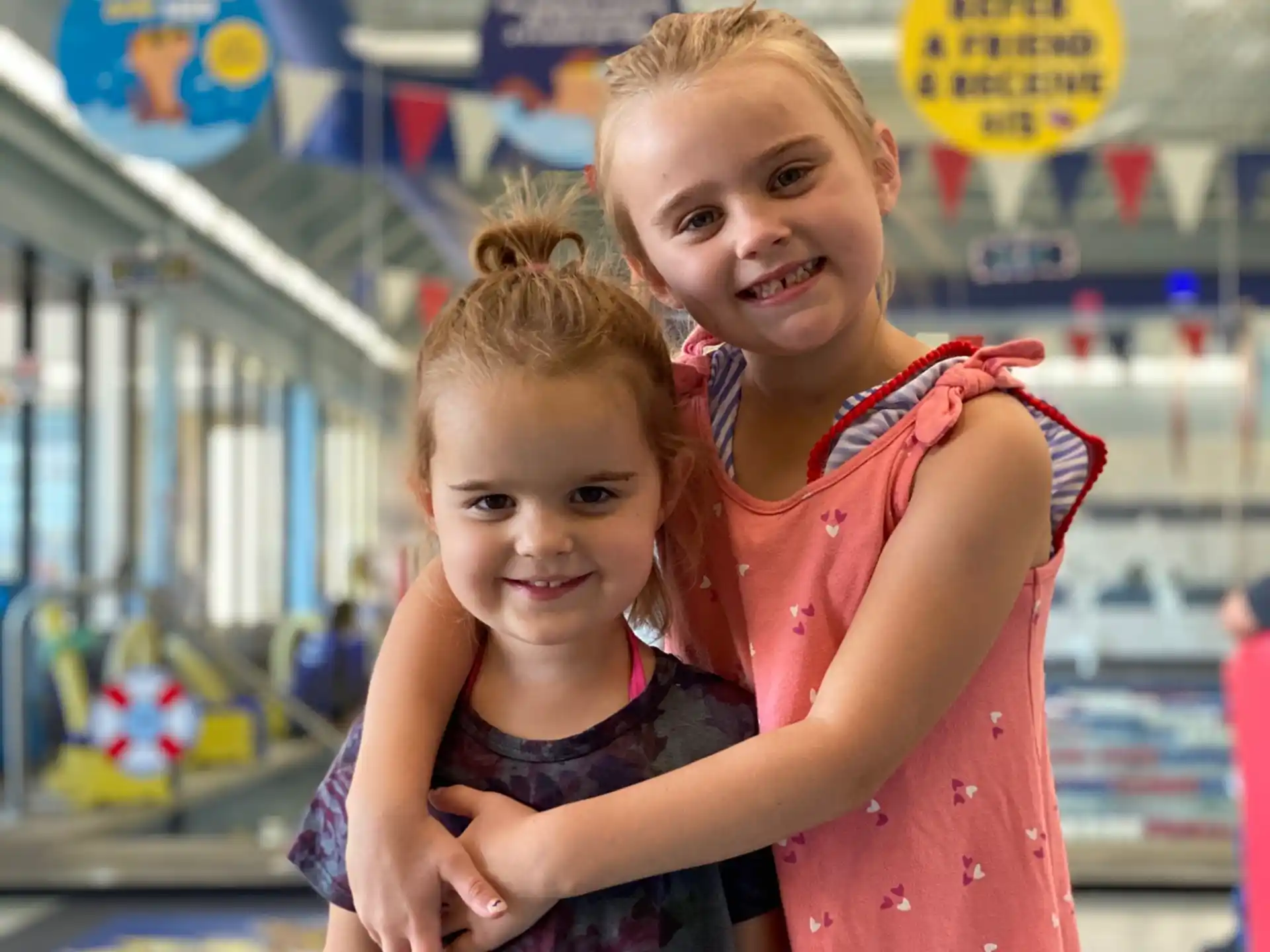 two girls posing for a picture