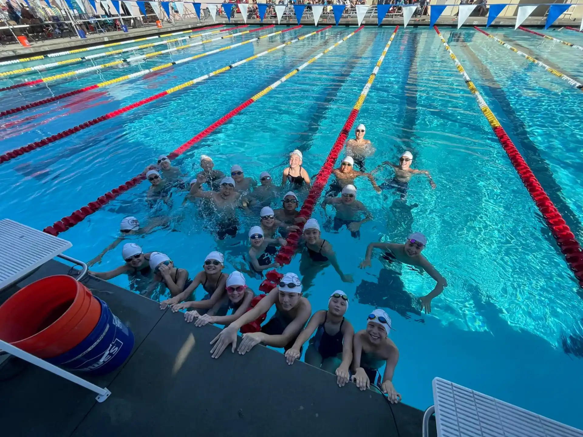 a group of people in a pool