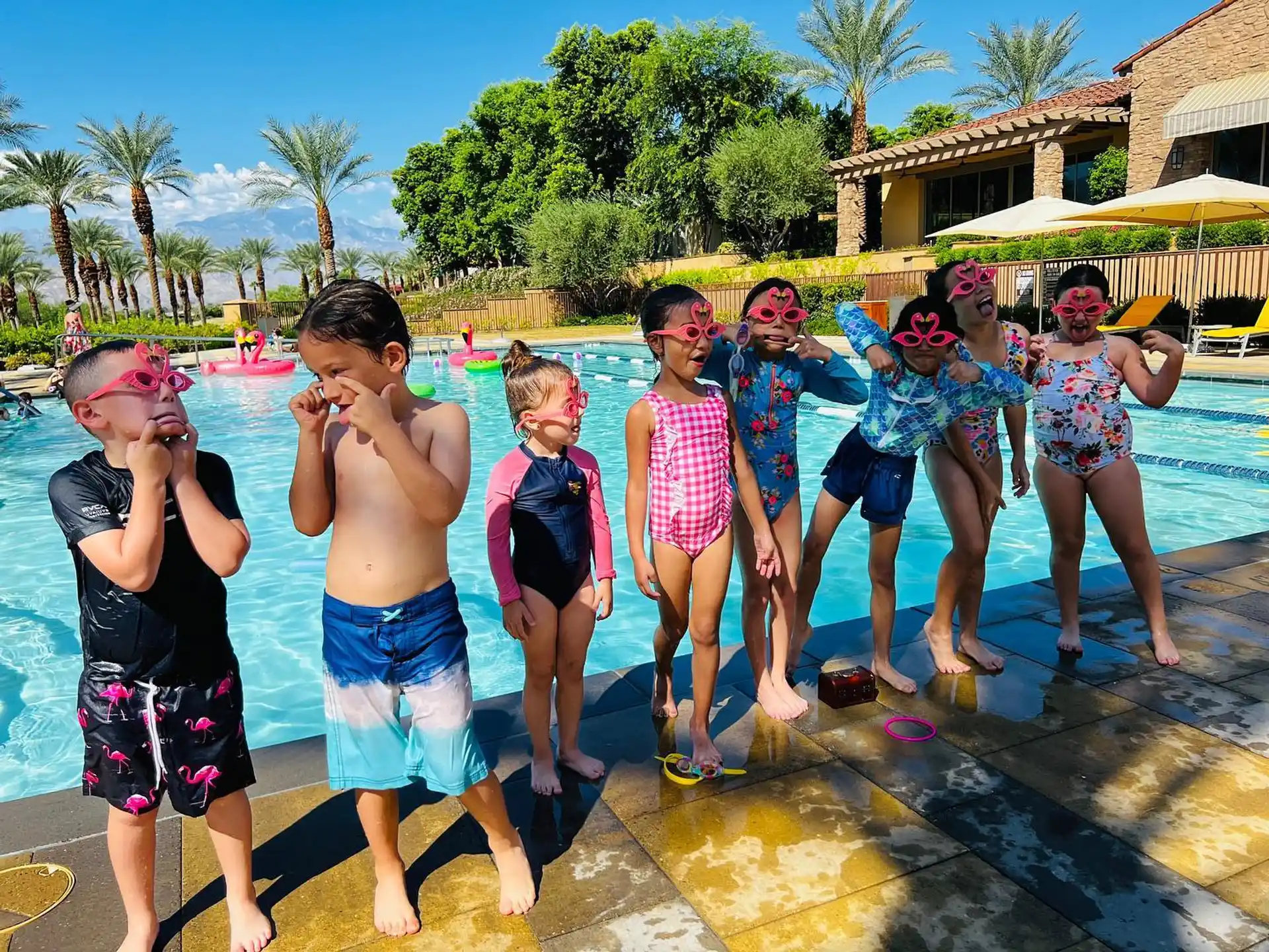 a group of children in a pool