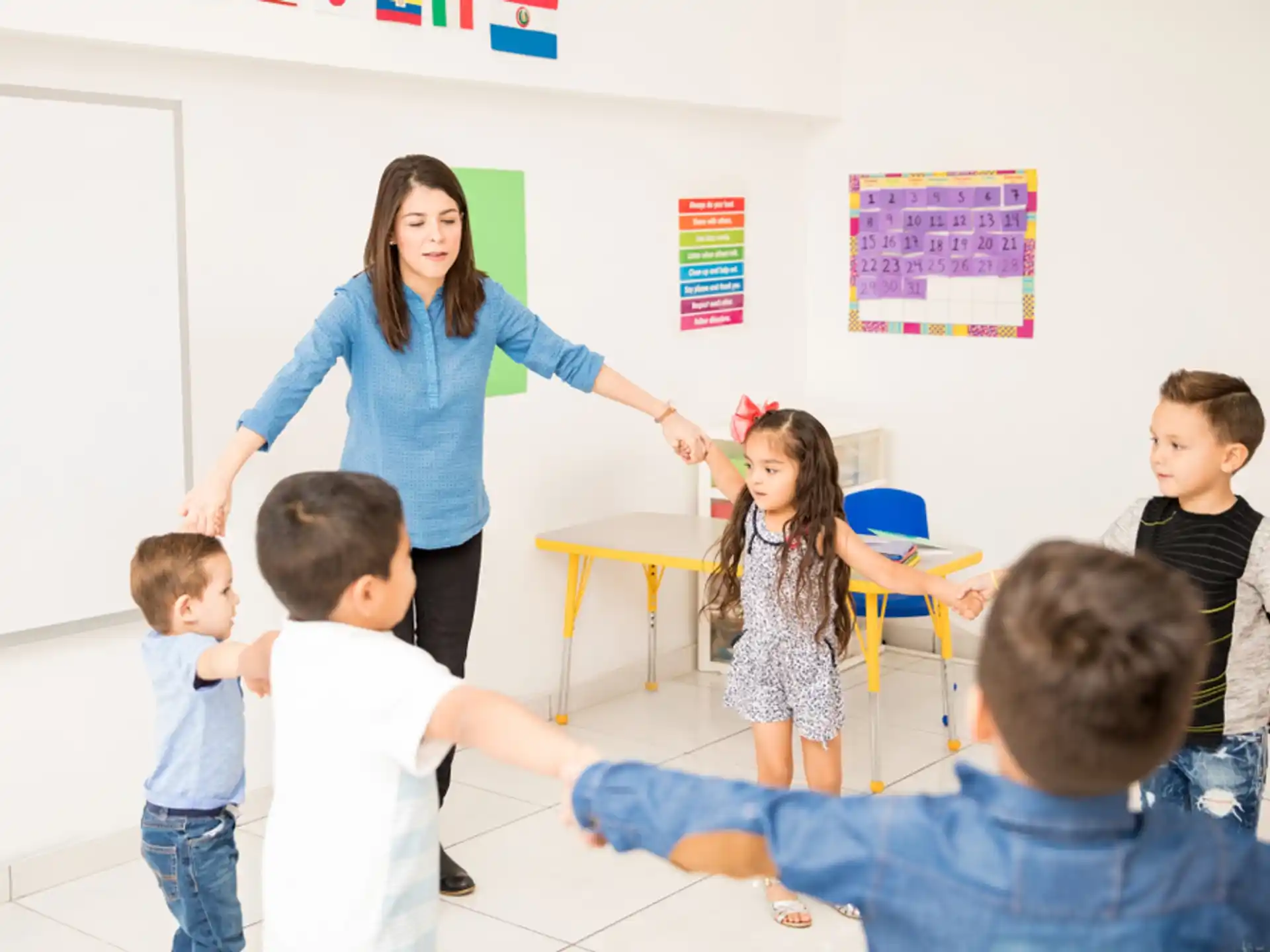 a person teaching children in a classroom