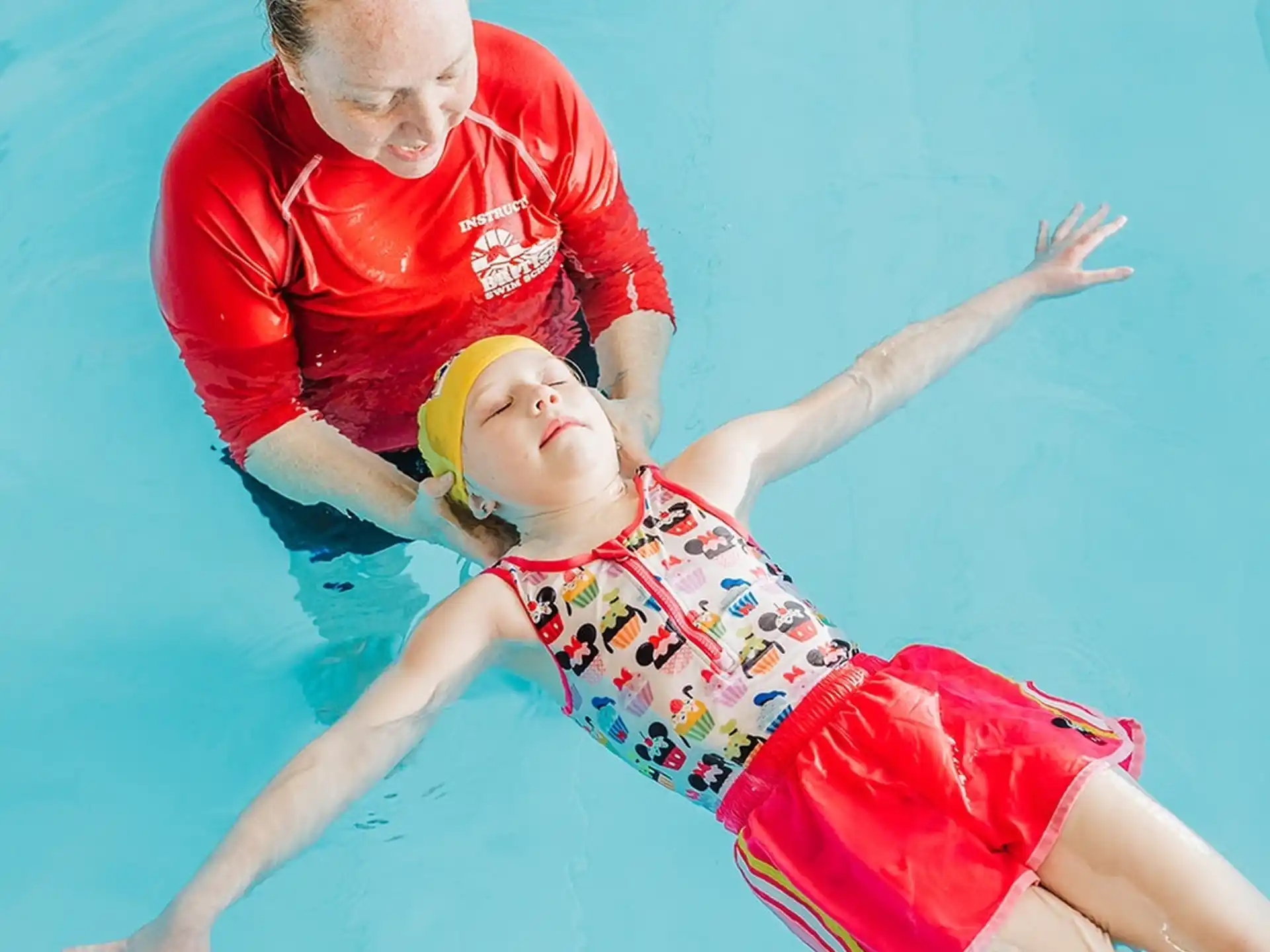 a man and a child jumping in the air