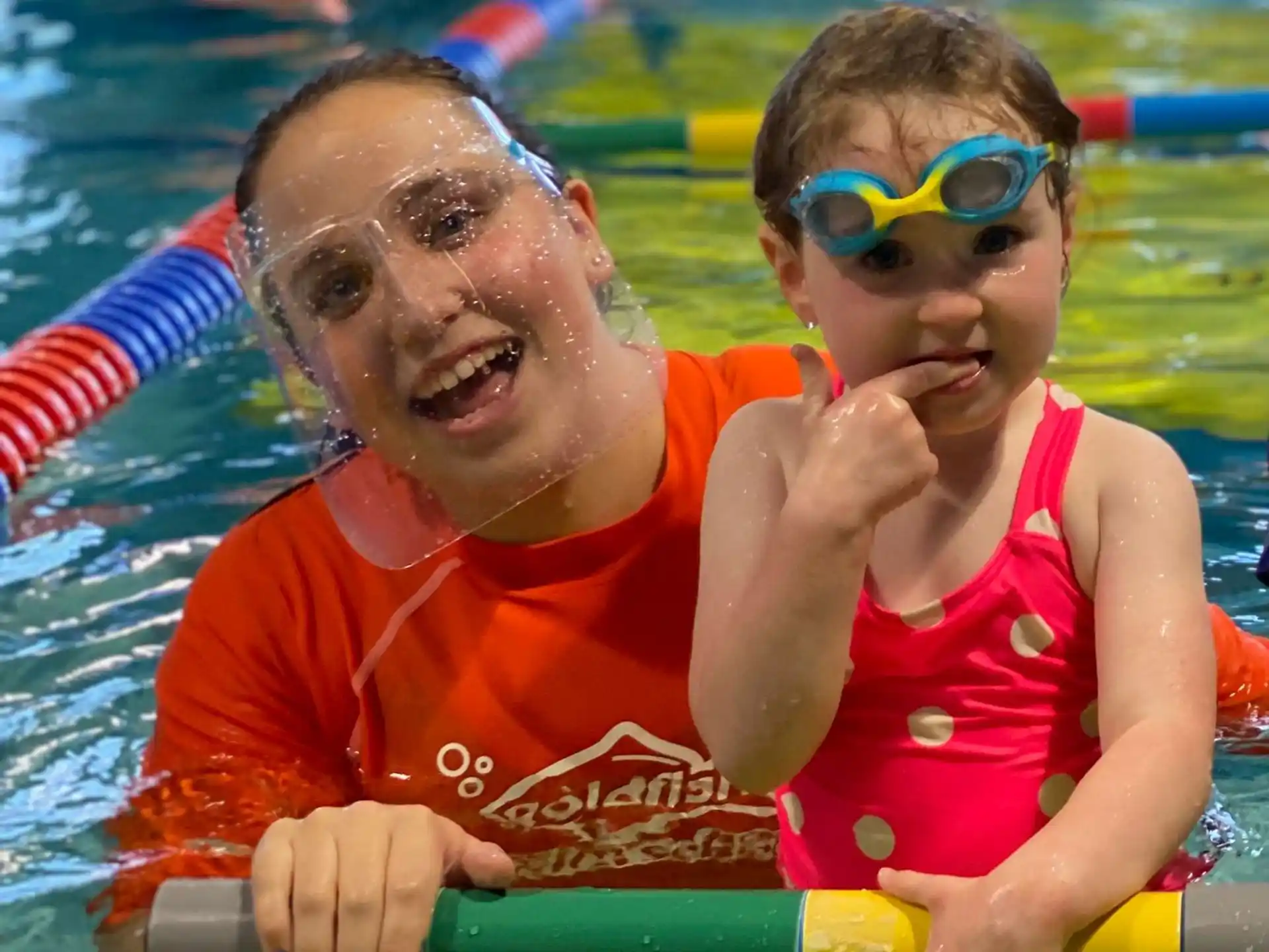 a man and a woman in a pool
