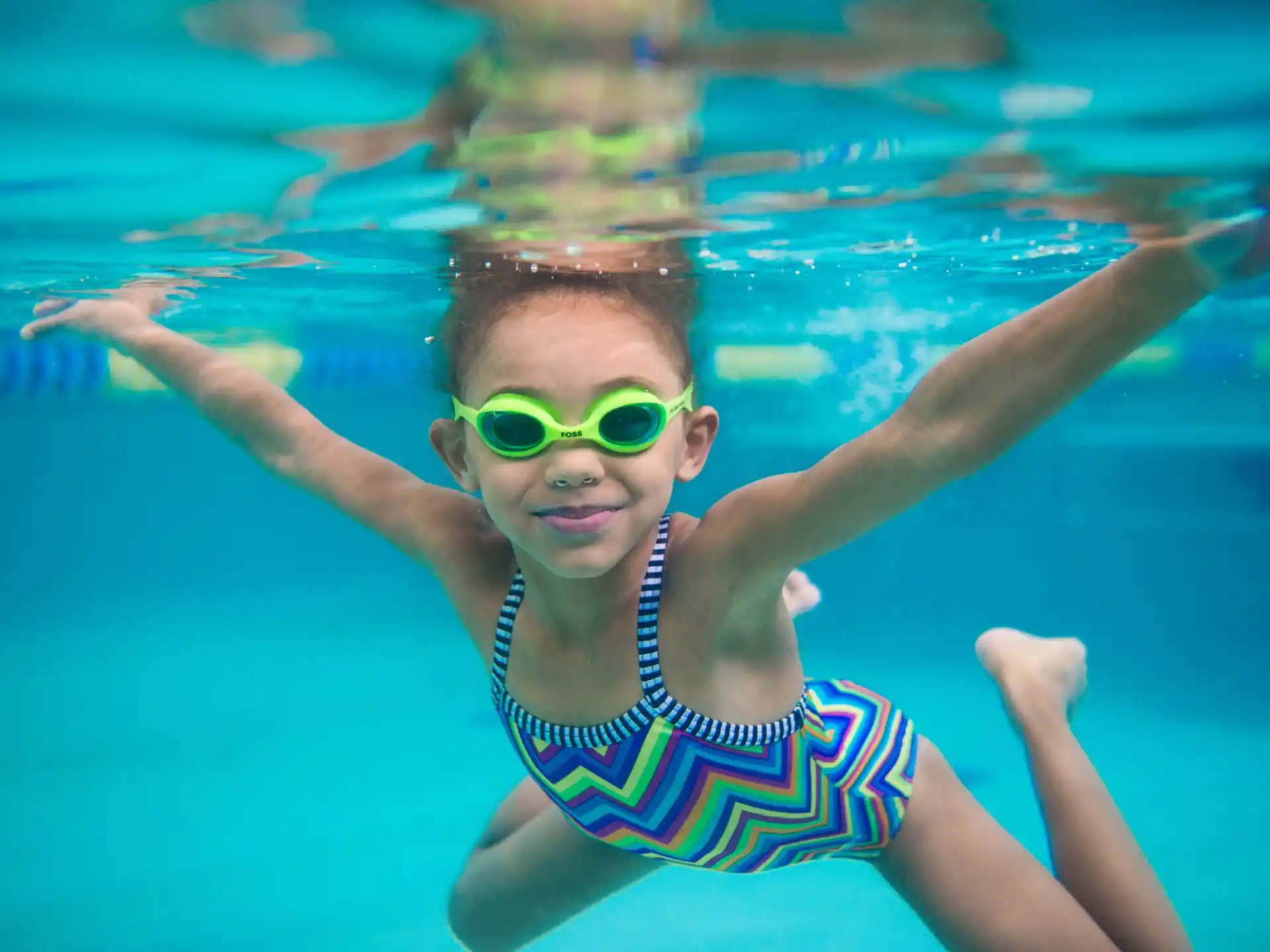 a child in a pool