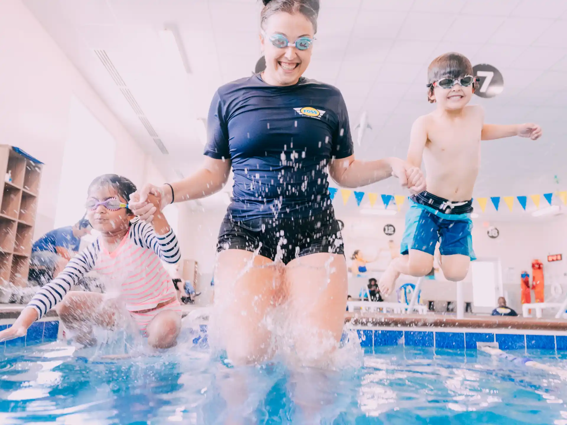 a group of people in a swimming pool