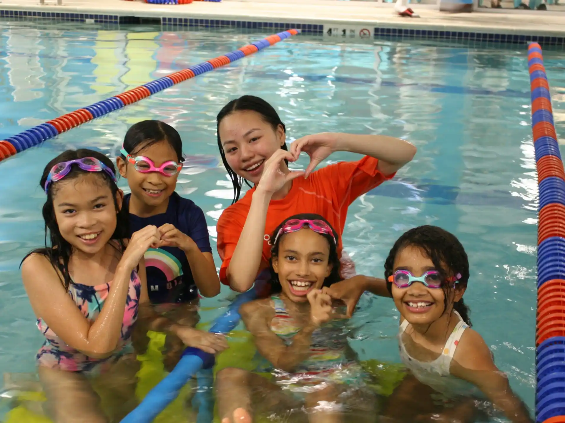 a group of people in a pool