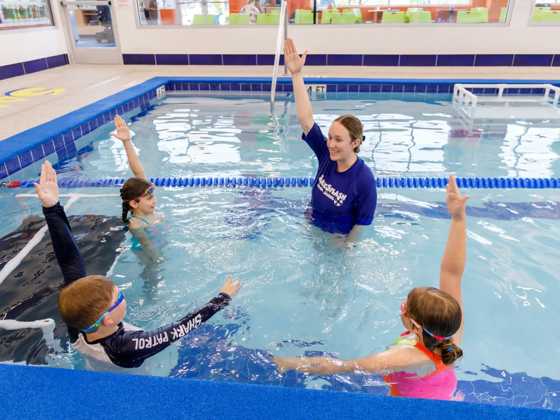 a group of people in a pool