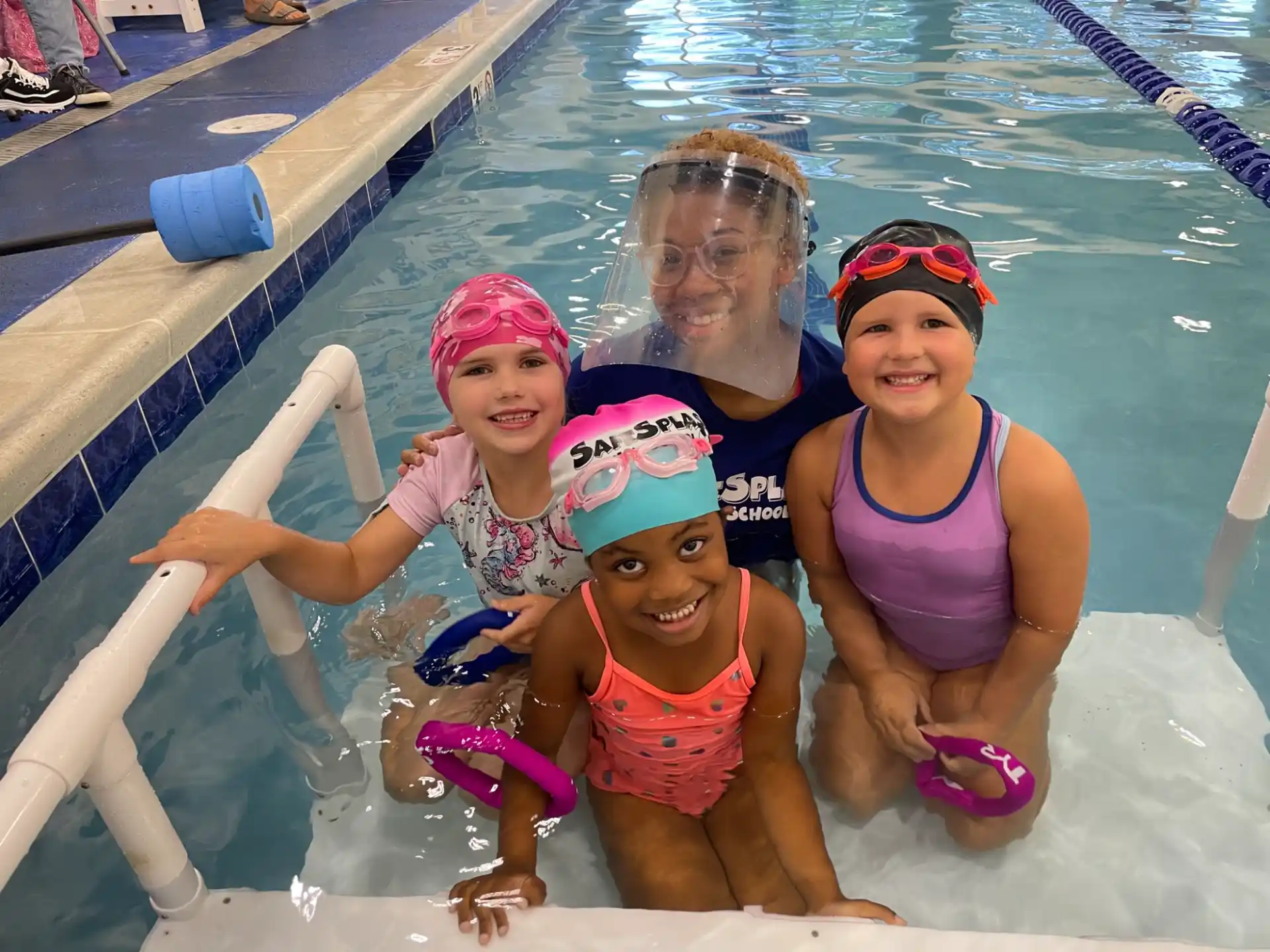 a group of women in a pool