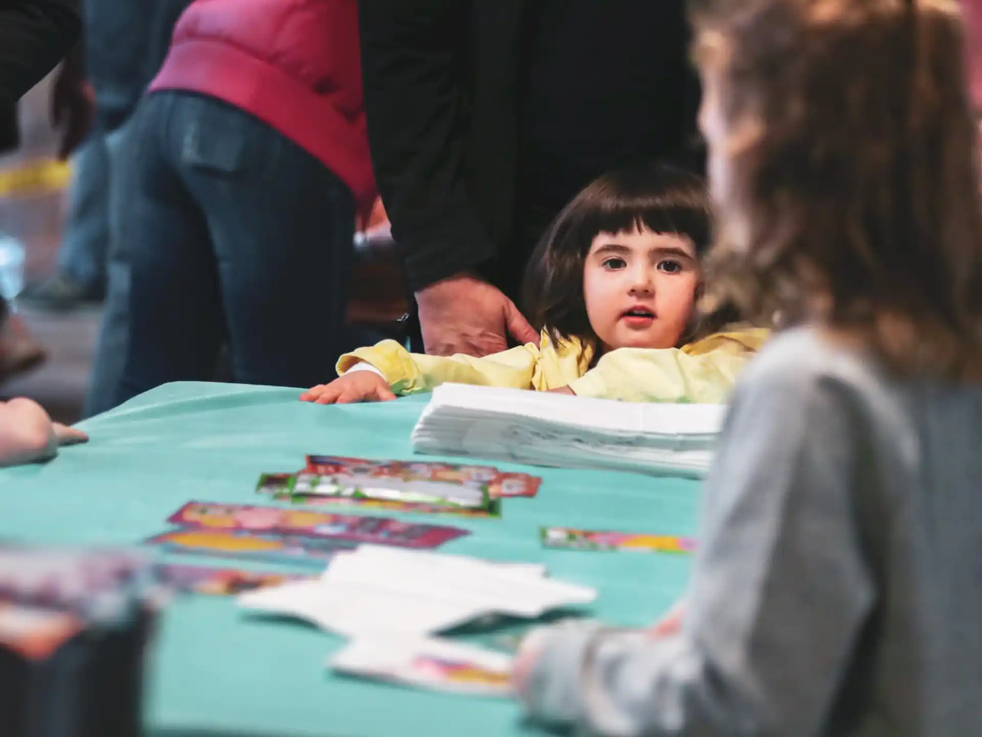 a child sitting at a table