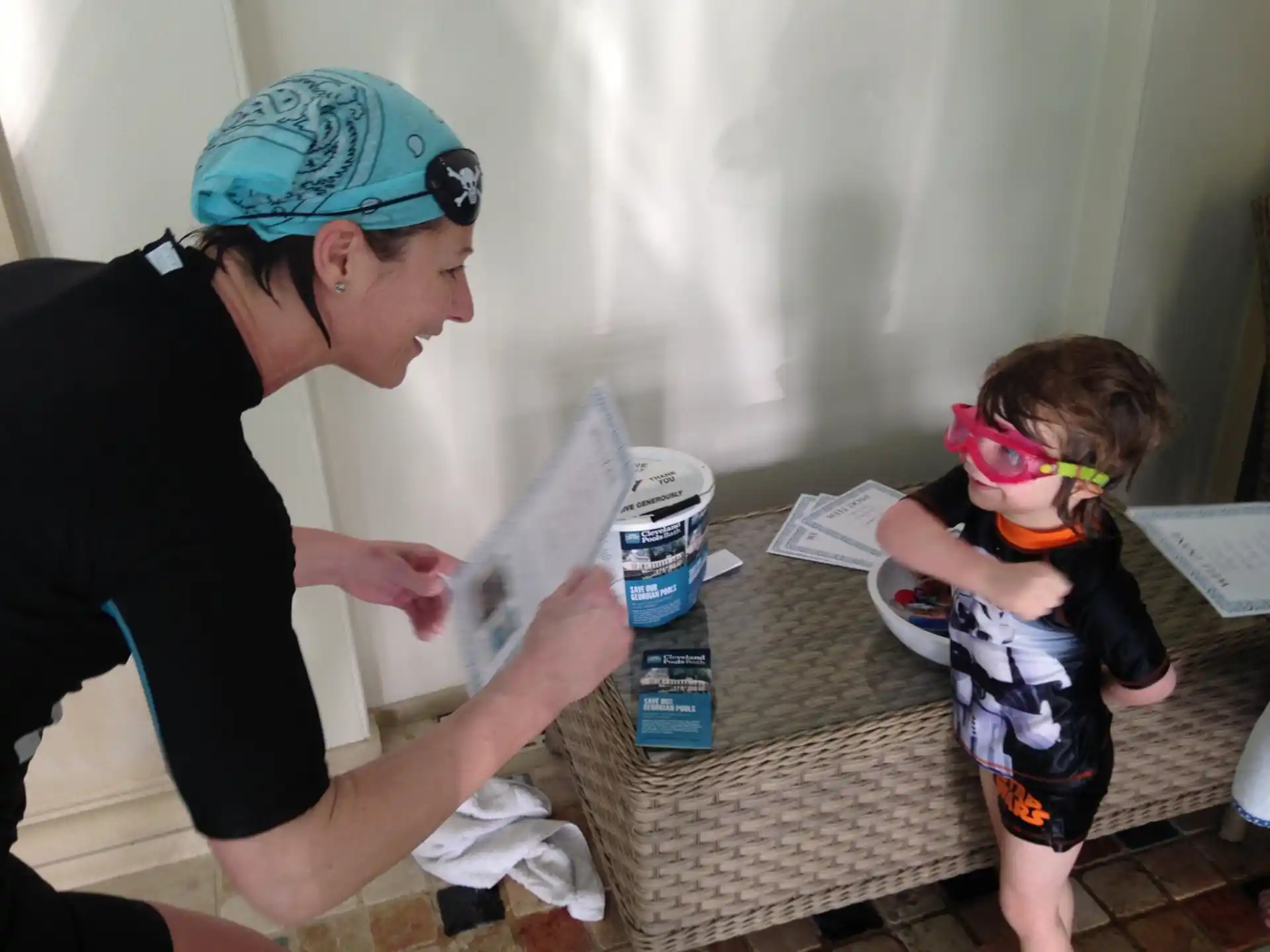 a person and a child with a toy
