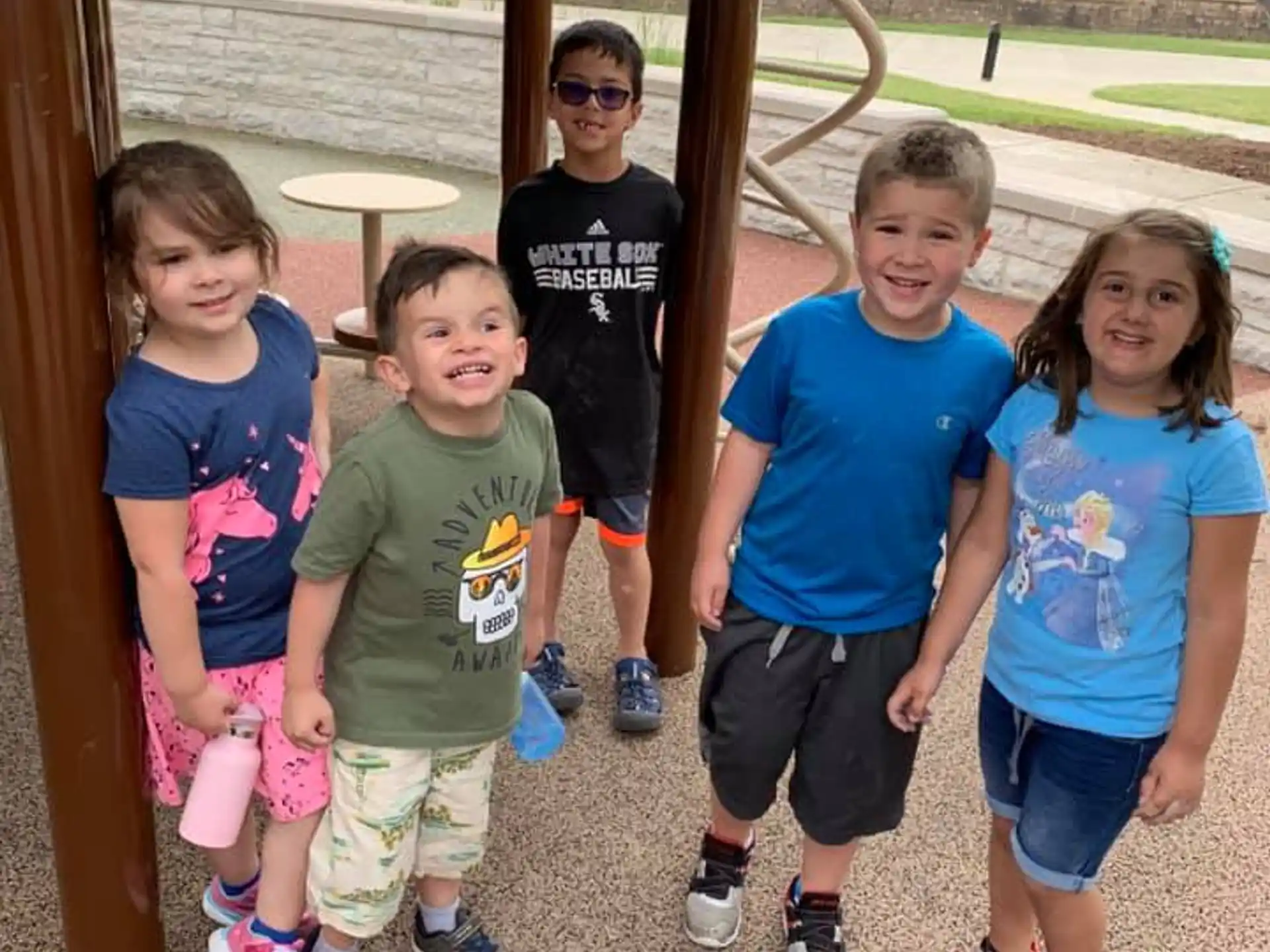 a group of children posing for a photo