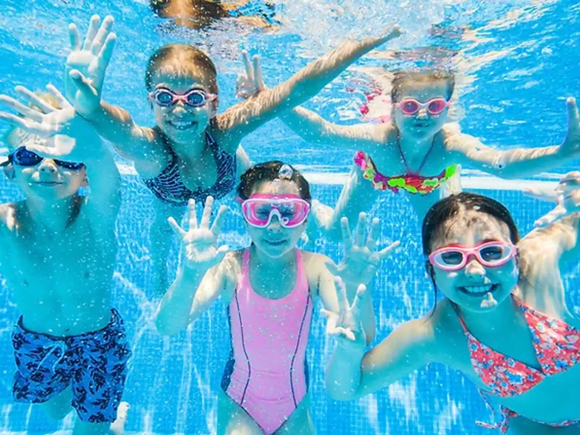 a group of people in a pool