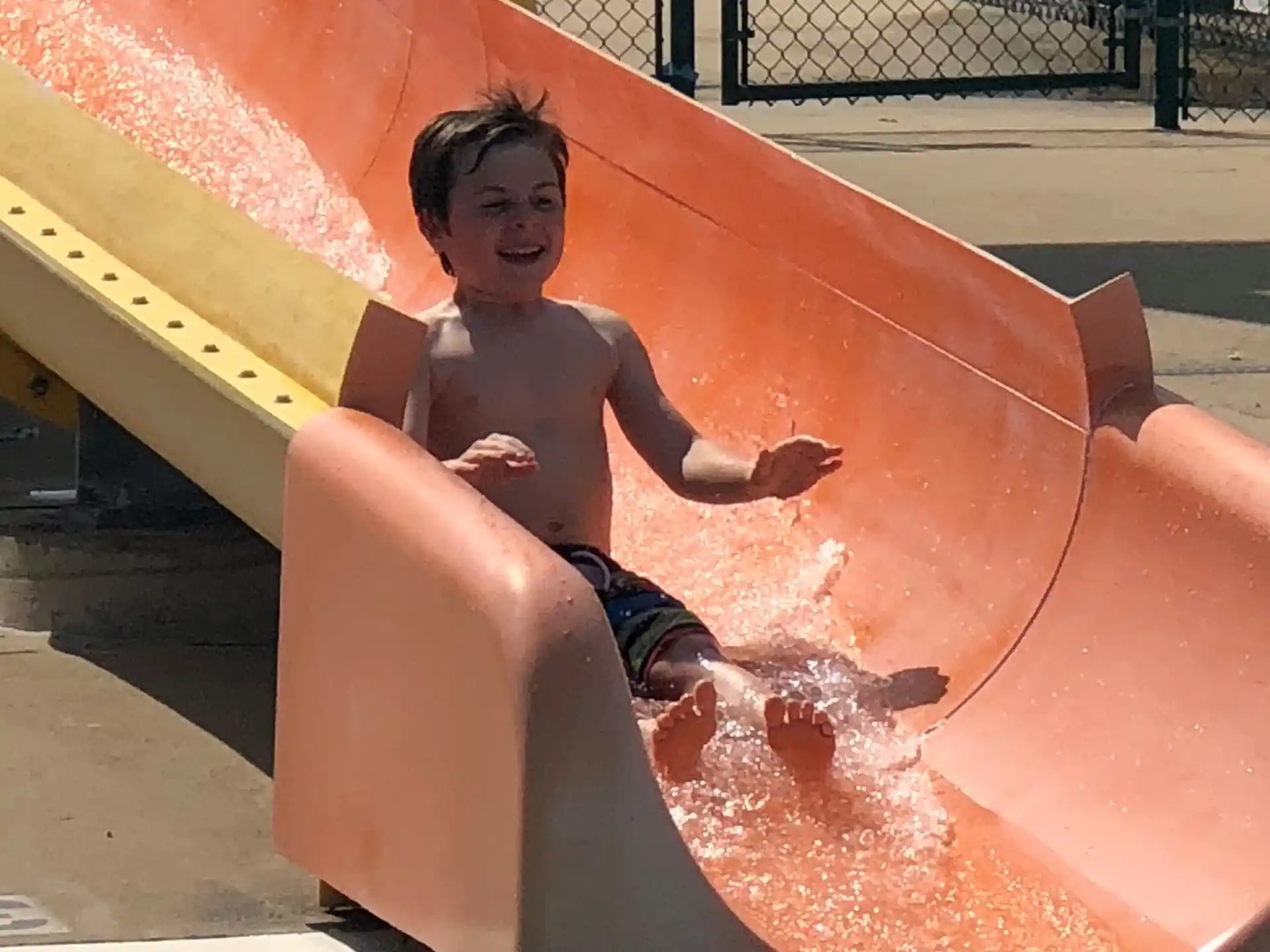 a boy in a pool