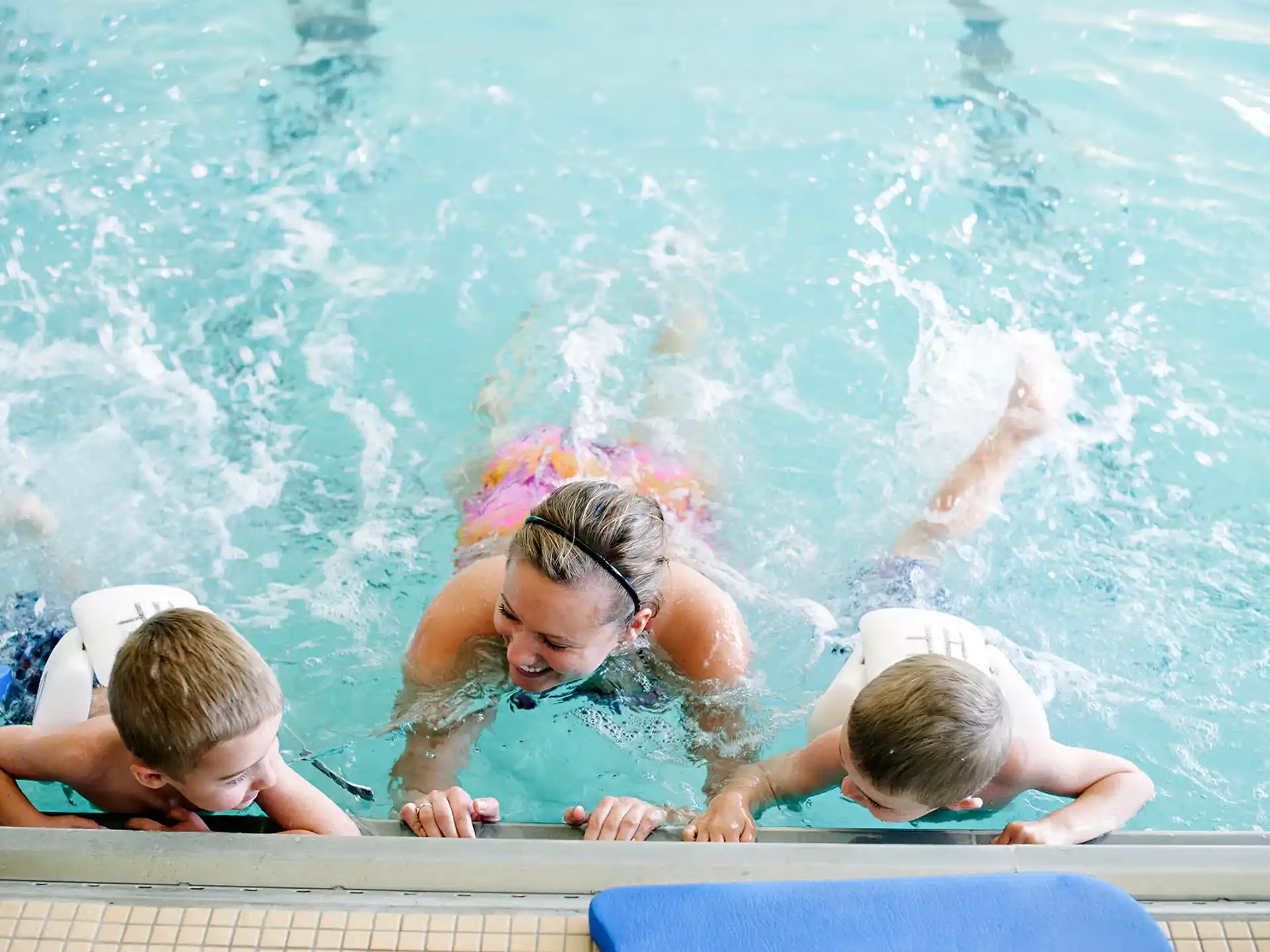 a group of people in a pool