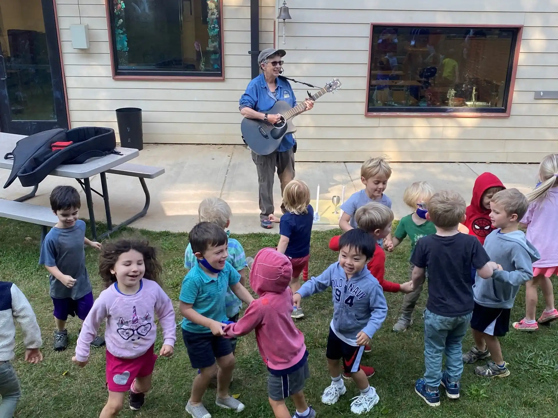 a group of children playing instruments
