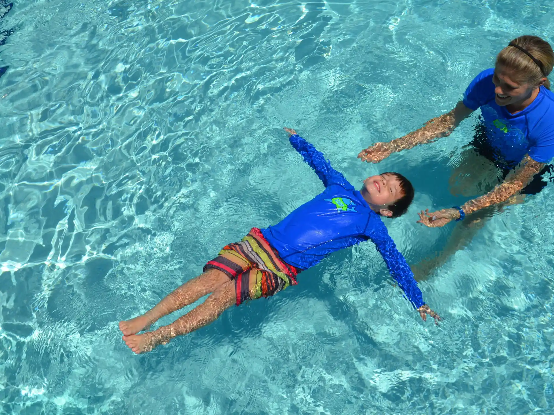 a couple of people in the water