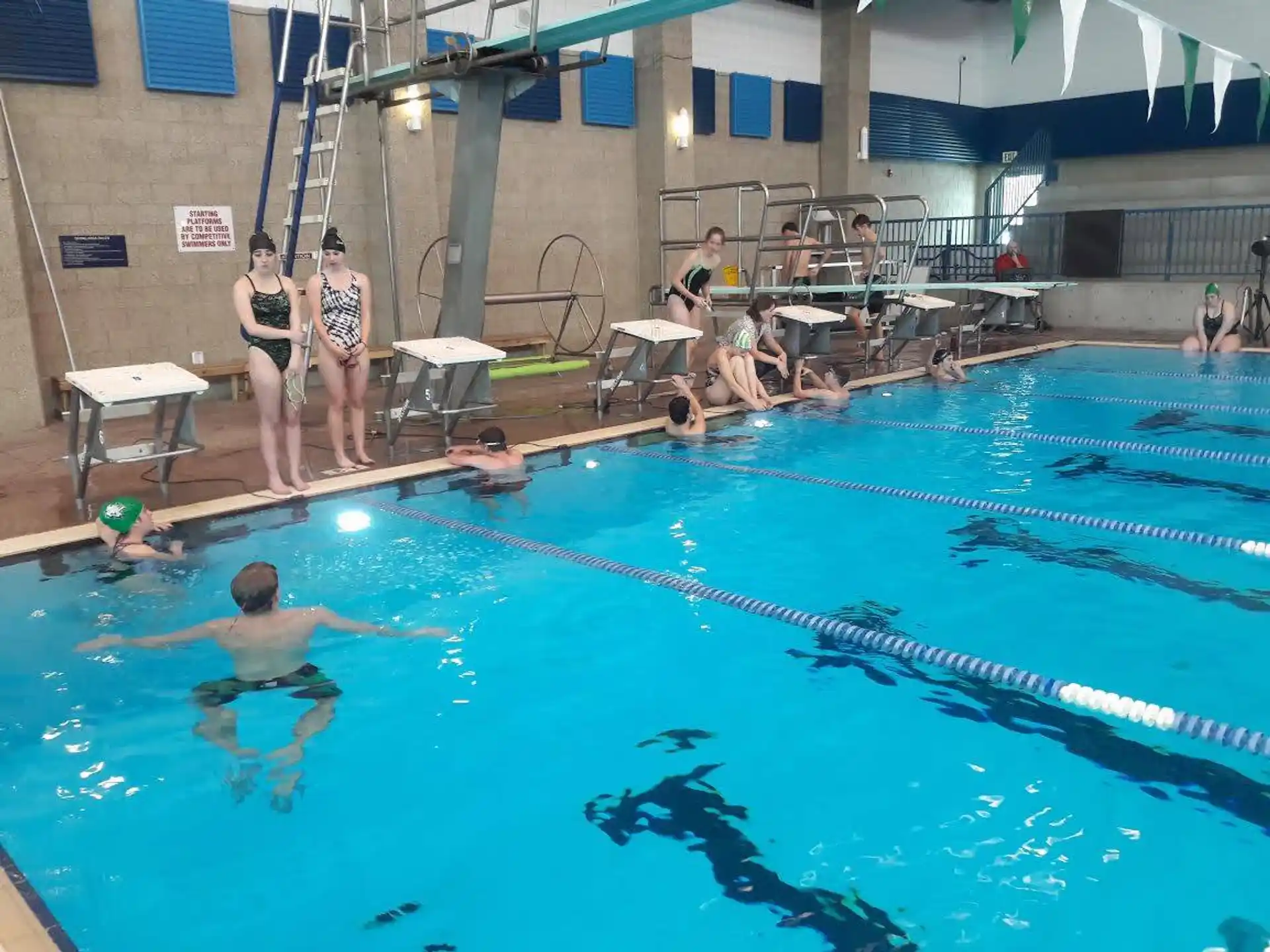 a group of people in a pool