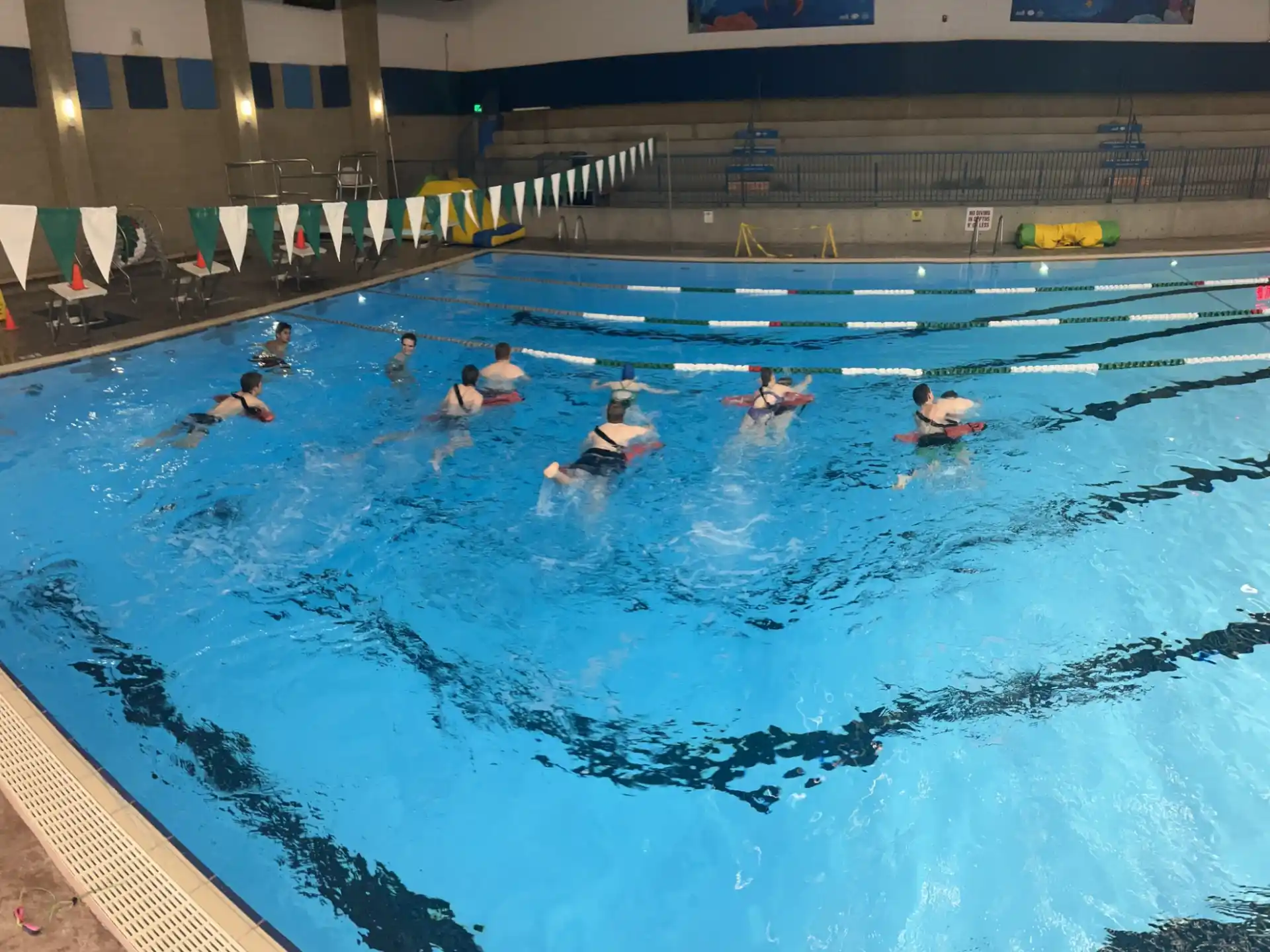 a group of people in a pool