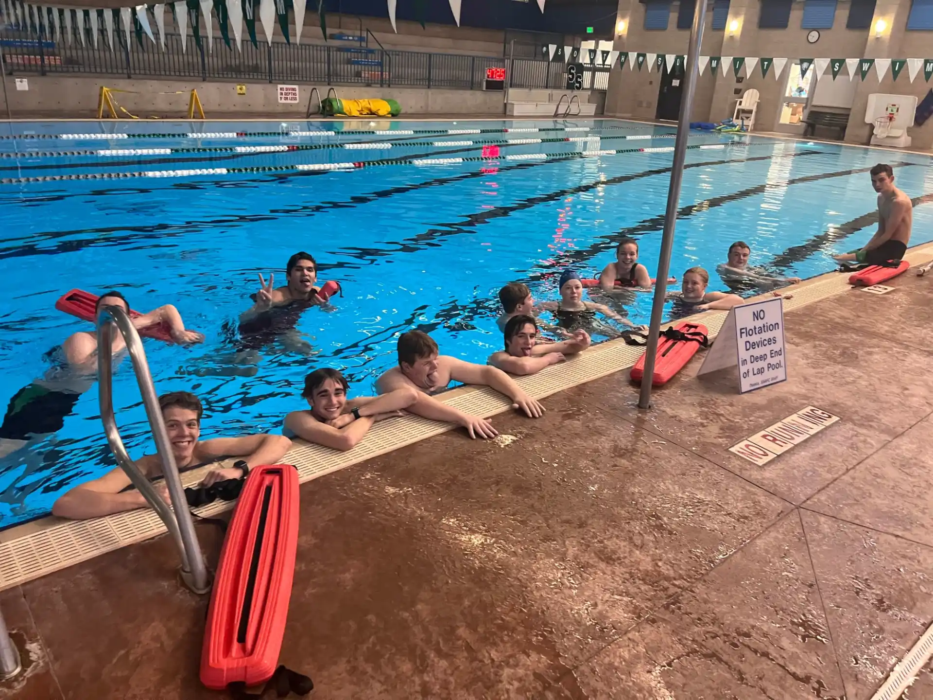a group of people in a pool