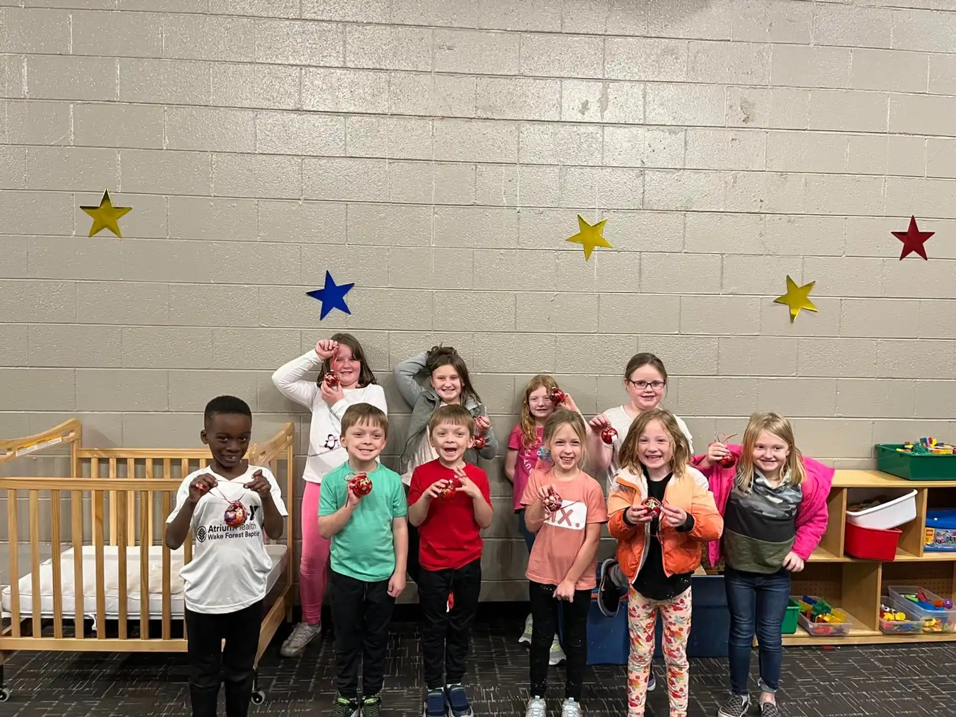 a group of children posing for a photo
